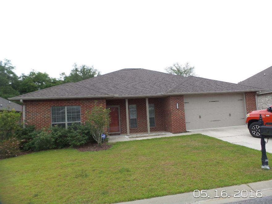 Available 04/15/2017..Or sooner.....Fabulous 5/2 South I-10 home has easy access to all bases, beaches and shopping. Executive style home has great curb appeal and convenience. Open concept floor plan features Laminate flooring, tile and carpet throughout the home. Nice foyer and formal dining area, large family room and open kitchen. Kitchen features custom cabinets, granite counters, breakfast bar, eat in kitchen area, stainless appliance package and more. Bathrooms also feature the nice cabinetry and counters. Spacious bedrooms and the 5th additional room can be used as a nursery or office area. Washer and dryer provided with rental rate. 2 car garage and large back yard with privacy fence. Pets may be allowed with a $400 non-refundable pet fee. Sorry No Cats (Allergies).