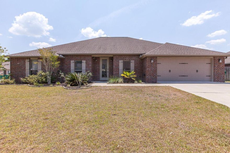 Updated photos just added! Welcome home to this all-brick beauty with 5 bedrooms, 3 baths, formal dining, plus bonus room that's located in Crestview's southernmost neighborhood! Approx commutes: 7thSFG/Duke: 10min, Eglin: 20min, Hurlburt: 35min! In the kitchen you'll find granite counters, custom cabinets, center island & breakfast bar! Extra upgrades include crown moulding throughout the main living area and bedrooms & Bamboo flooring. The master suite is tucked away on this split floorplan and the bathroom is a retreat with double sinks, private toilet, & 'wet area' for the garden tub and separate shower! Don't miss the upstairs bonus room-great for a huge playroom, craft room, or 'mancave'! The screened-in patio is great for outdoor Florida living & the backyard is fenced. See today!