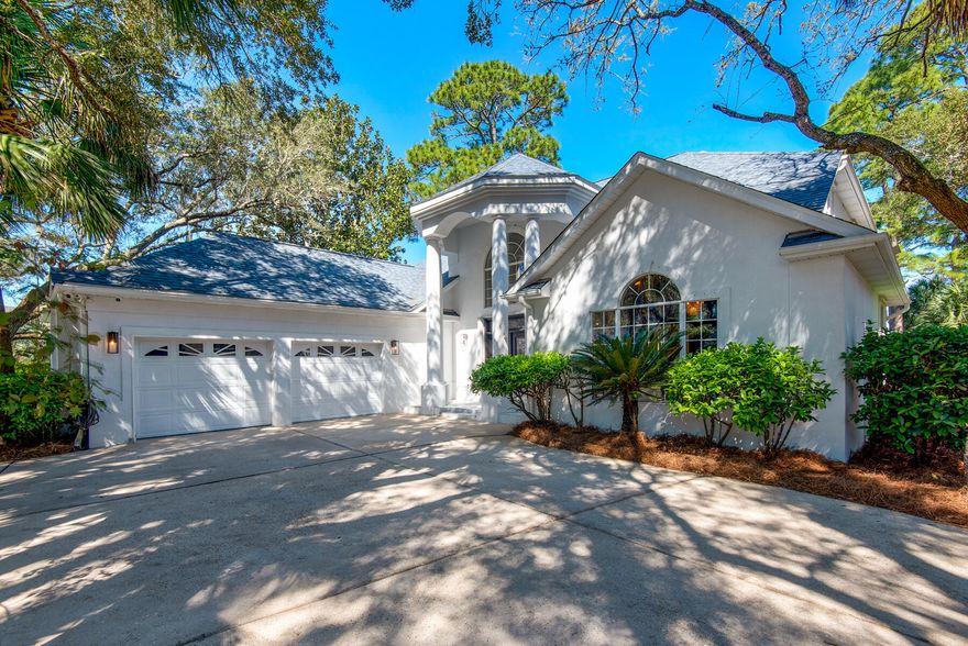 Protected, deepwater, custom two story home boosts 3200+ square feet with 3 bedrooms, 4.5 bathrooms and oversized 2 car garage located in the sought after community of Shalimar Plantation. The lush, mature landscaping includes different kinds of Palms and indigenous plants that highlighted in the evening with landscape lights. A sandy beach awaits you at the waterfront where you can easily launch your paddle board or hop on the dock where you'll find a covered boathouse, an uncovered slip and two jet ski lifts, plus fish cleaning station! Back inside the first floor features soaring vaulted ceilings with spectacular wall of windows that welcomes the Cinco bayou views, custom refurbished gas fireplace, chef's kitchen with walk-in-pantry, breakfast bar and nook. Just off the backside of the