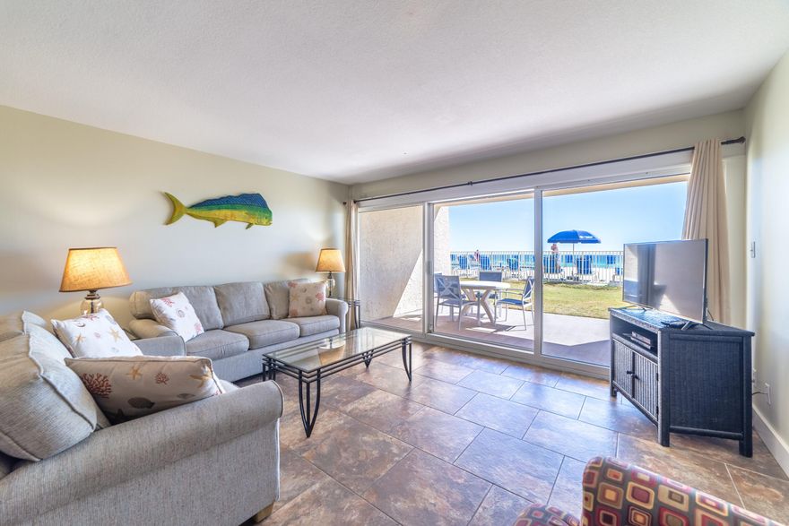 Embrace all the sights and aroma of the beach right out of your condo door. This first floor condo has incredible views of the beach and the pool allowing you to walk right out, no elevators needed. Boasting 2 bedrooms and two baths and able to sleep 7, this unit is spacious and allows a great space for outdoor entertainment. There are BBQ grills, exercise room and pickle ball courts for your enjoyment. Most impressive is the deeded access to 650 feet of beach front to relax and rejuvenate. Being so close, you can easily retreat to the condo for a snack or nap. This community is minutes away from shopping and restaurants for convenience and ease. This is a rare opportunity to buy a gulf front condo at the Beach House. Call us today!