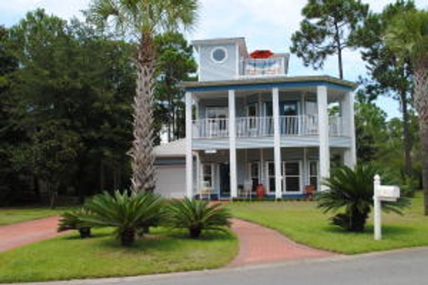 SOLD COMPLETELY FURNISHED. Less than 5 minutes to the Ed Walline Beach access. This lovely Florida Cottage has everything you need for a full time, 2nd home or vacation rental investment. This home has 3 Bedrooms, 2 1/2 baths. Open kitchen with beautifully finished cabinets and granite counter tops, large open living room, sitting room/dining area. The 2nd Floor has two guest bedrooms with a jack-and-jill bathroom. The master bedroom is also on 2nd Floor which offers a walk-in closet and covered porch. 3rd Floor offers loft with deck. New Lexington Oak flooring throughout the 1st and second floor. Stroll out to your beautifully landscaped yard with charming patios ready for entertaining. The community pool is resort style with 14,400 Sf and a multi-level swimming pool