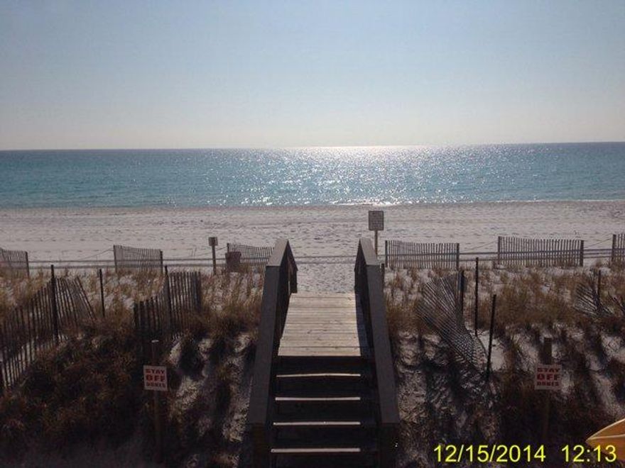 It's All About the View...! The beach is just out your back door from this 3 Bd / 3 Ba town home with fresh paint & new appliances. The 2nd floor features the main living space including dining, living with fireplace, kitchen & master suite with private balcony. Tile flooring through out the entire unit. The unit has gone through mold remediation which included drywall repair, new paint, stucco repair & paint. All you need to bring is your furniture & beach chair! No Maintenance Fees!