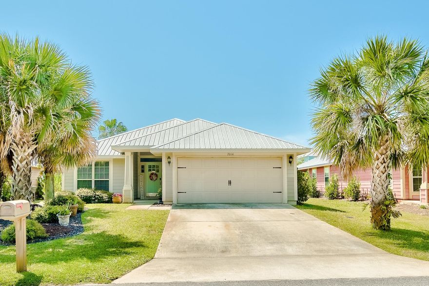 Fantastic one level 4-bedroom home only two blocks from the Choctawhatchee Bay. Just down the street is the E Hewett boat ramp where a boat, paddle board, or kayak can be launched to enjoy the coastal lifestyle! This home has beautiful curb appeal with tropical landscaping & a welcoming covered entrance as well as a large, fenced-in backyard. Upon entering the home you are greeted with raised ceilings, an open floor plan & luxury vinyl floors throughout the common areas as well as some of the bedrooms. The spacious living area has direct access to a covered patio, perfect for grilling and outdoor dining. Stunning details extend throughout the home such as beautiful archways, larger baseboards, bull nose corners, and Moen faucets. The open dining area is spacious enough for large gathering.