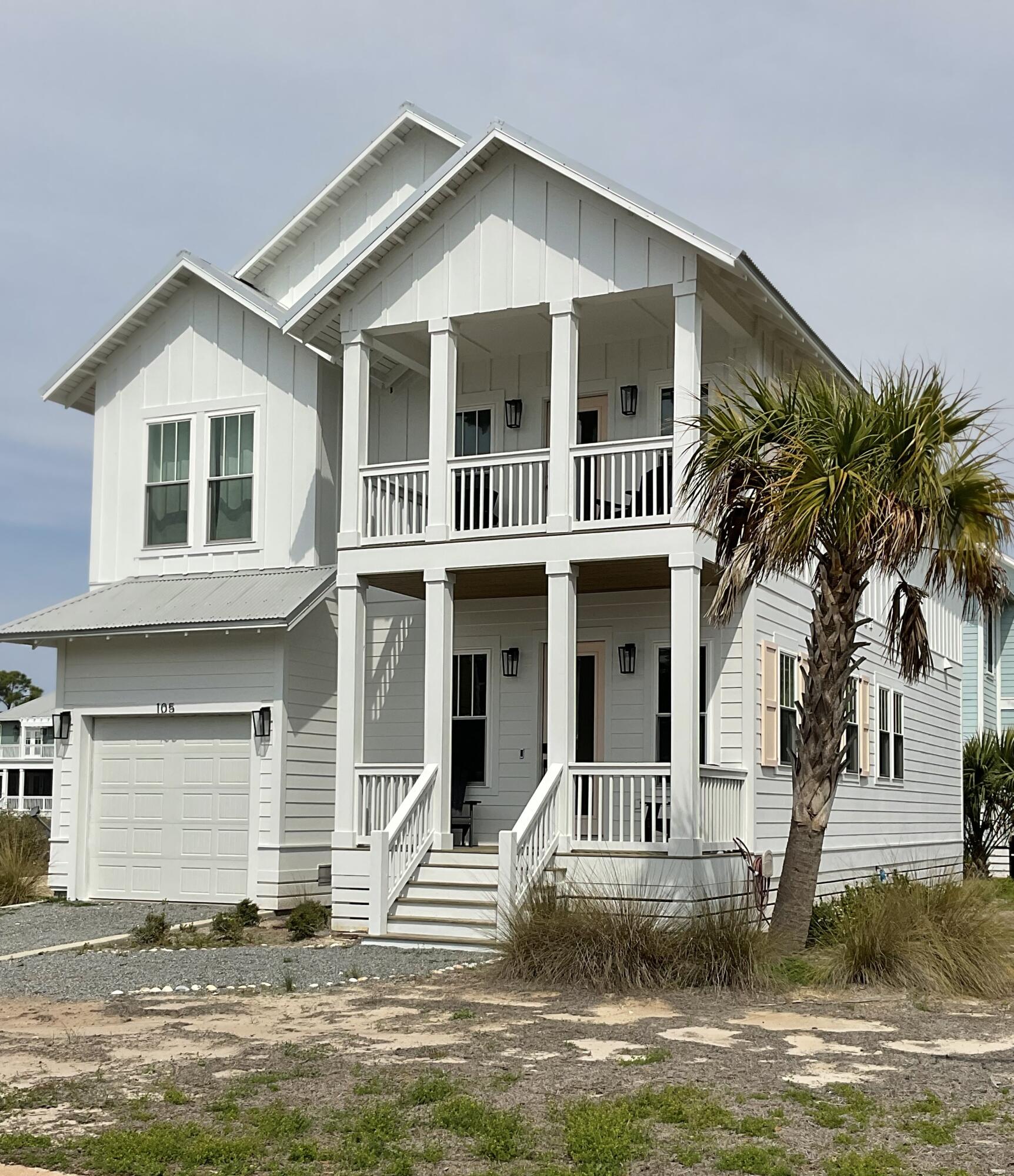 Stunning fully furnished beach home that is situated on a corner lot with gulf views. This 4 bedroom 3.5 bath home is located in the exclusive and gated community of Jubilation at Cape San Blas that is contiguous to scores of acres of federal land. Enjoy privacy, security, dedicated beach access, and a large community pool area that is all centrally located in the heart of Cape San Blas yet only 15 minutes to downtown Port St. Joe. Excellent layout with a large great room design upon entry from the front covered porch with spacious living and dining areas. The adjacent kitchen has spacious cabinets, beautiful waterfall quartz island, quartz countertops, stainless appliances, and rear entry. The master bedroom Ensuite is also located on the ground floor which is rare in a beach home