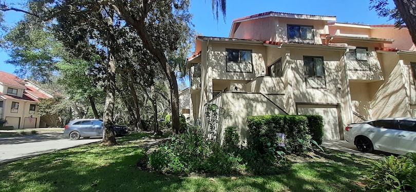 Beautifully updated and partial water view.Corner unit , white cabinets in kitchen, Gas Range,Large breakfast bar, screen porch, 2 decks, dual vanities in master and large tile shower. Extra areas include loft area in 3rd bedroom that has a walk in closet and large enough for the queen bed, another area finished on garage area that could be used for office or 4 bedroom. Great room with fireplace with cathedral ceiling and large patio doors to deck, 2nd deck off the kitchen area. Great price for water community.