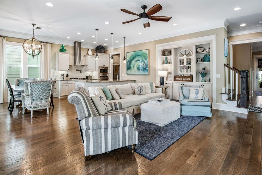 Welcome to your luxury beach retreat, South of 30A, in the sought after community of Prominence. This expansive four bedroom four and a half bathroom home is being sold fully furnished and is rental ready, currently sleeping 14. Offering 2,777 square feet of interior space and lots of covered porch space, there's plenty of room for everyone to spread out. As you approach this Florida cottage you'll first notice the spacious covered front porch, a perfect place for sunset conversations. Step inside through the glass front door you'll find custom touches throughout. You'll notice the attractive wood flooring, the eight feet high doors, crown molding and custom cabinetry showing off the quality, while the plush furnishings make you want to kick your feet up. The kitchen is a chef's paradise f