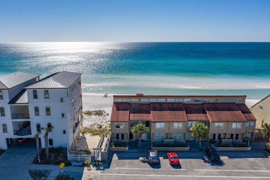 OWN YOUR PERSONAL PIECE OF PARADISE DIRECTLY ON THE SAND WITH PRIVATE BEACH & SECURITY GUARD & >180K PROJECTED NET 2021 INCOME!  As opposed to other properties that offer private 'beach access', this home includes your own EXCLUSIVE, PRIVATE BEACH from corner to corner of deck down to walkway in front water for ONLY owners & their guests. A GIANT 34x21 new deck adjoins your private beach.    W/stunning Gulf views from almost every room, live the beach front lifestyle you've always dreamed of. New to the rental market June 1, this power house