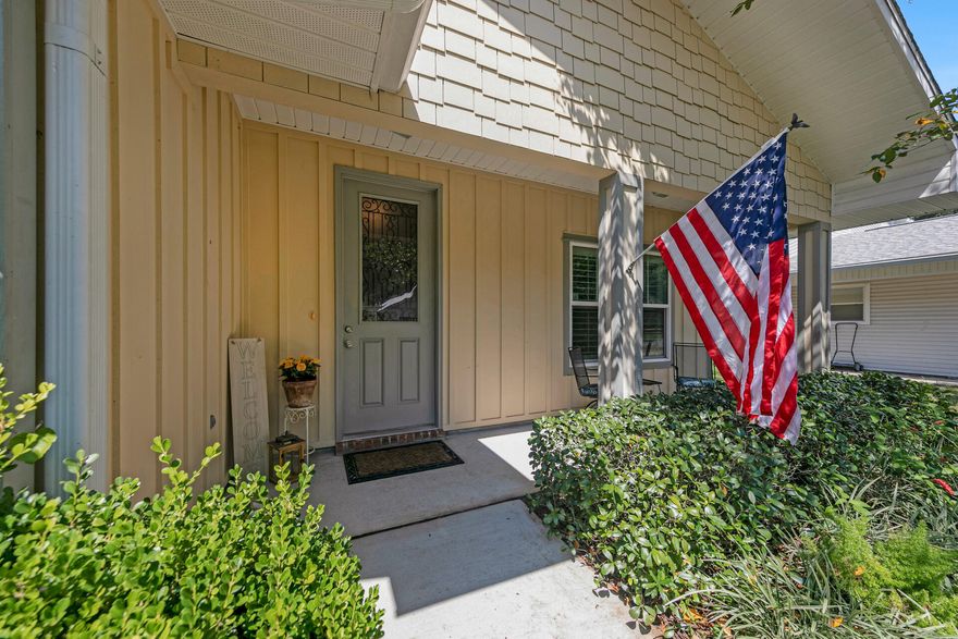 Spacious Tracy Acree built home wrapped in cottage charm! From the quaint front porch to the covered back patio, this 3B/2B is filled with the warmth of home. Highlights include an open concept kitchen with maple cabinetry, granite countertops, deep double sink, stainless appliances, pendant and recessed lighting plus 9' and floating ceilings. Beautiful hardwood and crown molding compliment the main living and dining areas. The Master Suite features his and hers closets and ensuite bath with double vanities, separate shower and garden tub. (Mana Bloc plumbing control system installed.) Backyard is fenced and features turf for easy maintenance.  No thru traffic street convenient to Hurlburt Field and Eglin and just minutes to shopping, restaurants and the beach!  Survey available.