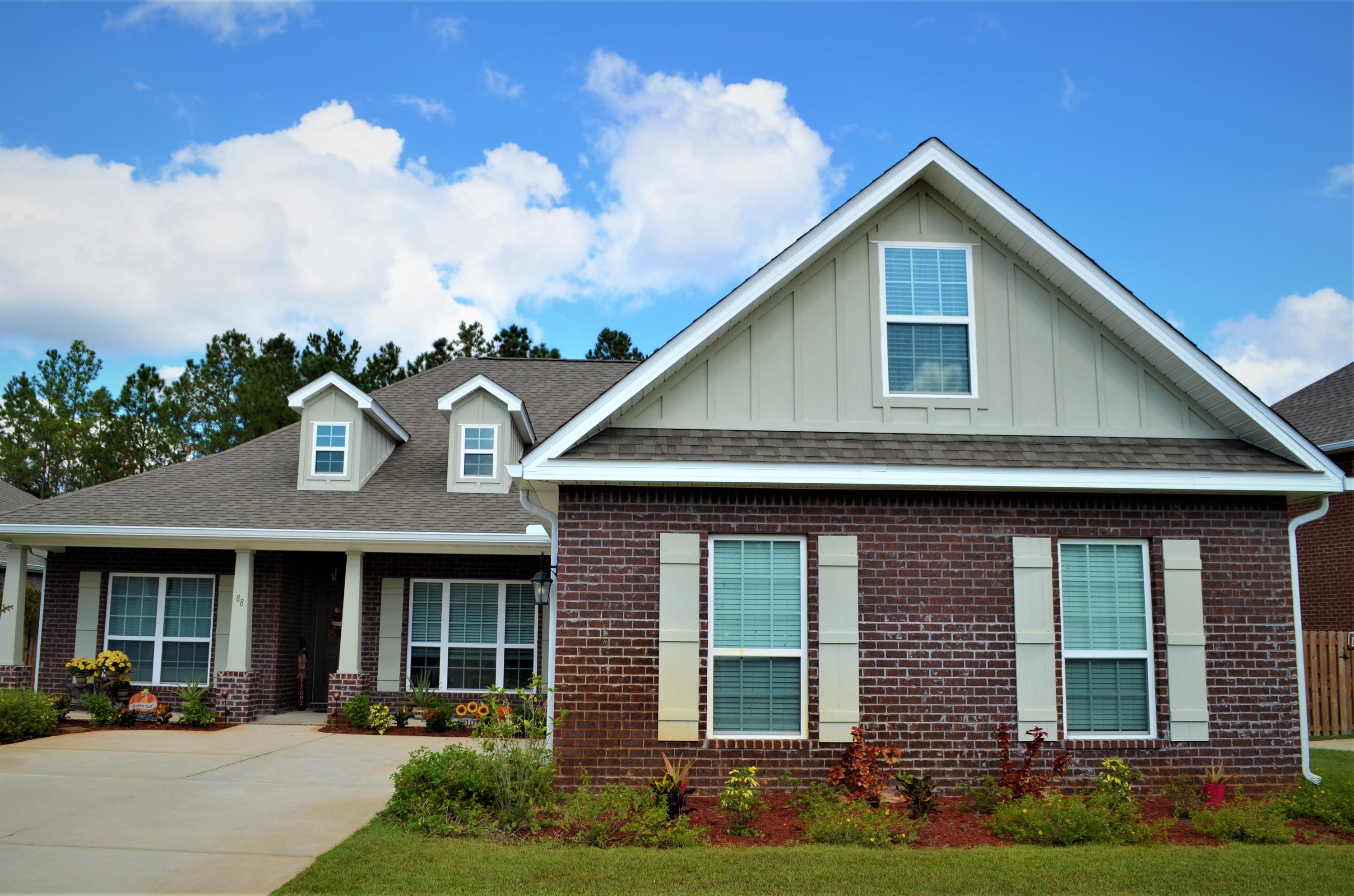 Imagine luxury community living in this spacious Craftsman home located on a quiet cul-de-sac in the Whispers community of Hammock Bay. This 2,726 sq ft property features owner upgrades like extra electrical features added with the developer before completion. Temperature controls for each floor, high speed internet fiber cable and storm windows designed to boost lighting from every angle of the home and showcase the back-yard gardens are a few of the surprises in this home. Formal dining room welcomes you into the property and the family room has been converted into a 5th bedroom upstairs and is huge. The master en suite is on the main level separated by living area and the large kitchen, dining space, and oversized living room with a corner fireplace looks onto a spacious back-yard.