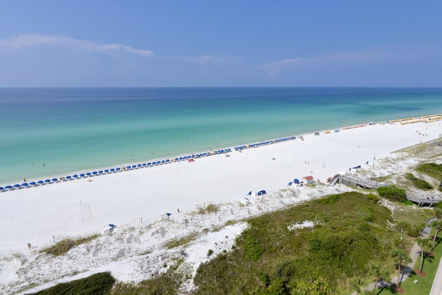 JUST REDUCED! PHENOMENAL VIEWS! Updated several years ago. Large spacious condo with a split floor plan for added privacy. If you are looking for a ''slice of paradise in the sky'' with outstanding views, Beach Manor 1207 is perfect! Floor to ceiling windows in the dining room and a comfortable family room. Beach Manor is a gulf front condo with 600 ft of private deeded beach for your enjoyment. Tops'l Resort is a world class tennis facility offering 10 Rubico Clay Tennis Courts. Resort amenities include: spa, state of the art fitness center, indoor/outdoor pool, a pro shop, walking trails and 24 hour gated security. Tops'l is just a few minutes away from Silver Sands Outlet Mall, Grand Boulevard and within a short distance to 30-A. Monthly HOA is $920.44 and quarterly master is $285.