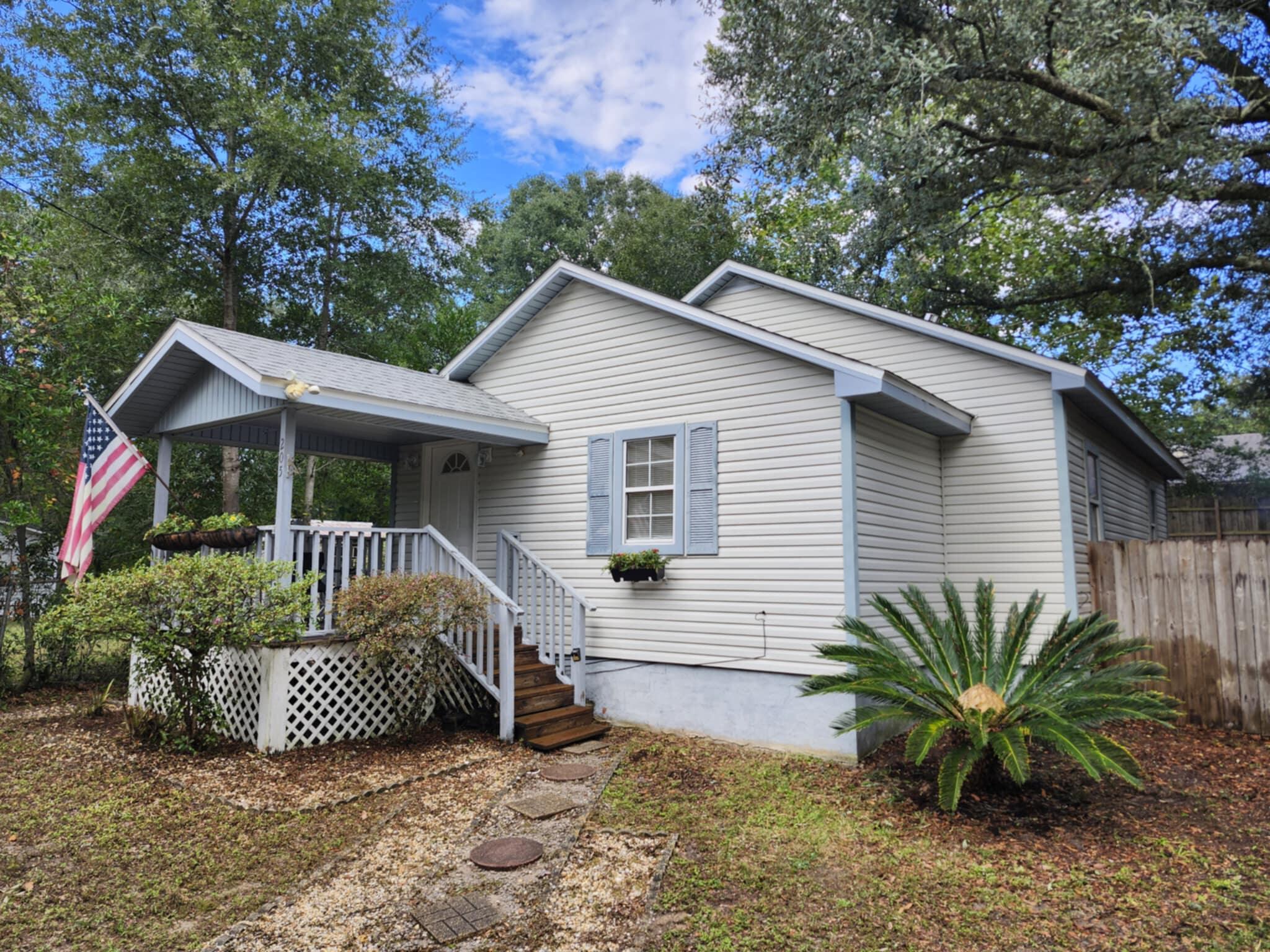 This cozy 3 bedroom, 1 bath home offers the comfort of LVP flooring, fresh paint, crown molding, granite kitchen countertops, updated stainless steel dishwasher and refrigerator, soft close cabinetry, and a screened in back porch. The roof and AC were both installed in 2019 and the updated tankless hot water heater was installed in 2023. This home is conveniently located next to the military base with an easy commute to shopping and the schools.