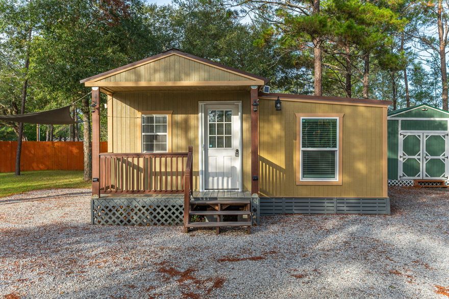 Back on the market!! Just appraised for $127,000 for an FHA loan....Discover this thoughtfully designed 418 sq ft cozy cottage, perfect for full-time living, a weekend retreat, or a short-term rental opportunity! This compact gem features 2 bedrooms, 1 stylish bathroom with a custom tile shower, and a welcoming living area complete with an electric fireplace for year-round comfort.The well-appointed kitchen boasts stainless steel appliances and a water purifier at the sink for added convenience. Inside, a tankless hot water heater ensures energy efficiency. Step outside to enjoy a fully sodded yard, raised garden bed, partial privacy fencing, and outdoor security cameras and lights for peace of mind. The oversized gravel driveway provides ample parking space, for guests or recreational vehicle. A standout feature of the property is the 10' x 12' shed which includes 100-amp electrical service, washer/dryer hookups (washer & dryer will stay), and an additional hot water heaterideal for storage, hobbies, or even a workshop. The property also offers an RV hookup with water, septic, and power, making it perfect for visitors or extended stays. This charming property is packed with features and ready for you to move in. Don't miss this unique opportunity to own a low-maintenance, low-utility cost, high-comfort cottage with modern upgrades and outdoor appeal! Conveniently located just 8 miles from the city of DeFuniak Springs, 18 Miles from Crestview, 22 miles from Niceville, & just 35 miles to the white sandy Gulf Coast Beaches.