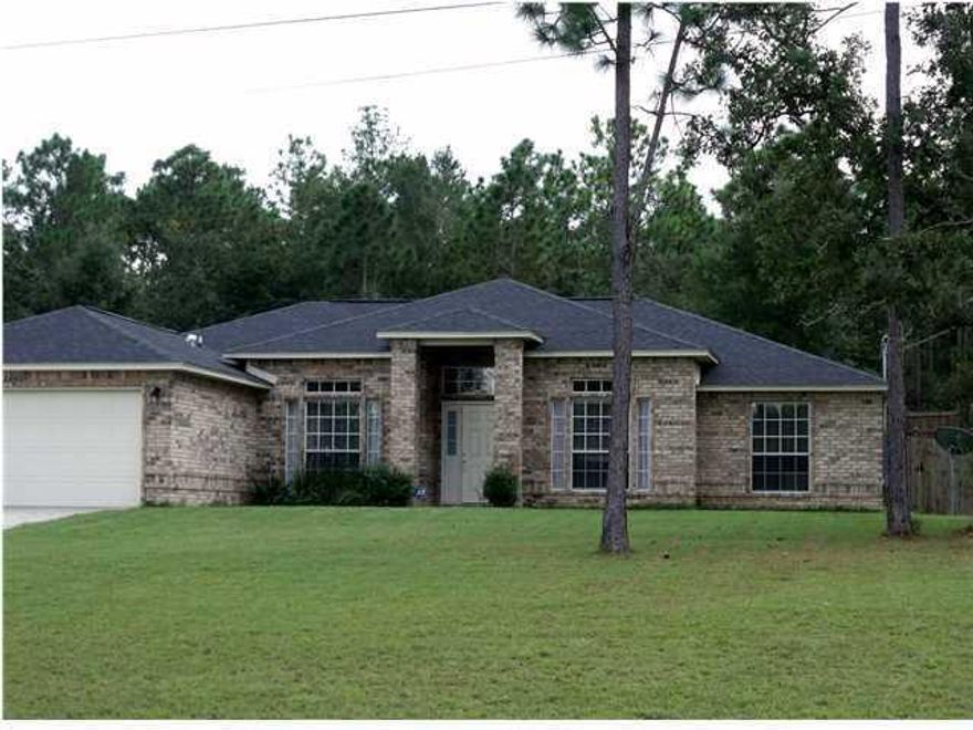 Amazing Curb Appeal. Beautiful and Stylish homeAll Brick, 4 bedroom home sits on oversized lot. Short drive to Eglin AFB, Duke Field and Beaches, and just minutes to shopping and dining. You will fall in love with the warm hard wood flooring when you enter the Grand Foyer. Large Family Room boasts 10 foot ceilings and sliding doors leading to back yard. Open kitchen and hop up bar complete with stainless steel appliances, granite counters, working island and eat-in area with Great Windows!! There is a Formal Dining Room and popular split floor plan. Master suite has trey ceiling and is large enough for a seating area. Relax in the Master Bath garden Jacuzzi jet tub! Separate shower, double vanity and 2, yes 2 walk in closets. Very large lot, tons of space. Come on over and take a look.