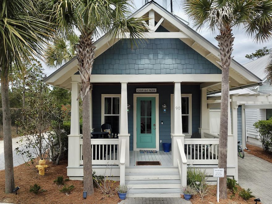Welcome to Seacrest's charming ''Casa del Agua''! This adorable beach cottage is full of ''Old Florida'' rustic charm.This darling one story home sits at the end of a quiet street adjacent to the nature trail. We love this home for so many reasons ...gorgeous Distressed hardwood floors, vaulted wood ceiling, kitchen with marble counters, custom cabinets, unique lighting, and stainless appliances, a five burner gas range and double oven. The patio and porch area are amazing. The community of Seacrest is Brilliant!! Seacrest is located on the 30 A Corridor between Alys Beach & Rosemary Beach. Owners and guests of Seacrest Beach get to enjoy a 12,000 sq ft Lagoon-style pool, tram service to the beach, deeded beach access, community amphitheater and 1.35 miles of shaded walking trail.