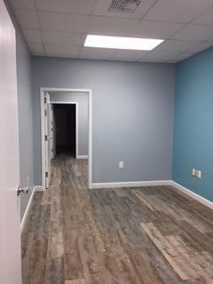 Beautifully finished professional office with all new floors and paint. 2 private office spaces with adjoining office/storage. Shared kitchen and bathroom. All utilities and common area cleaning included.
