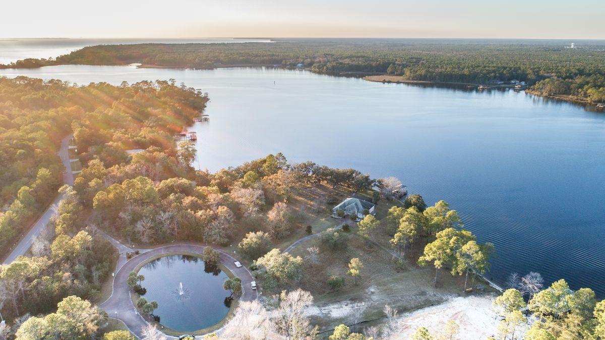 Boaters Paradise! This half acre home site, located in the 12-lot gated community of Lagrange Cove, offers 86 ft of shoreline on Lagrange Bayou, a true deep water bayou. Full service marina is located less than a mile to the north up Lagrange Bayou, for all your boaters needs, complete with marina store. Boat over to The Bay restaurant to enjoy bayfront dining at in South Walton. Restaurants, shops, and Publix grocery store also located less than 3 miles away. Build your custom home and take advantage of the open waterfront views of Lagrange Bayou. Neighborhood boasts central water feature, privacy fence with gate and 12 waterfront lots. Lot 9 faces north so boat dock should be better protected by land from major storms. This property is truly a rare find