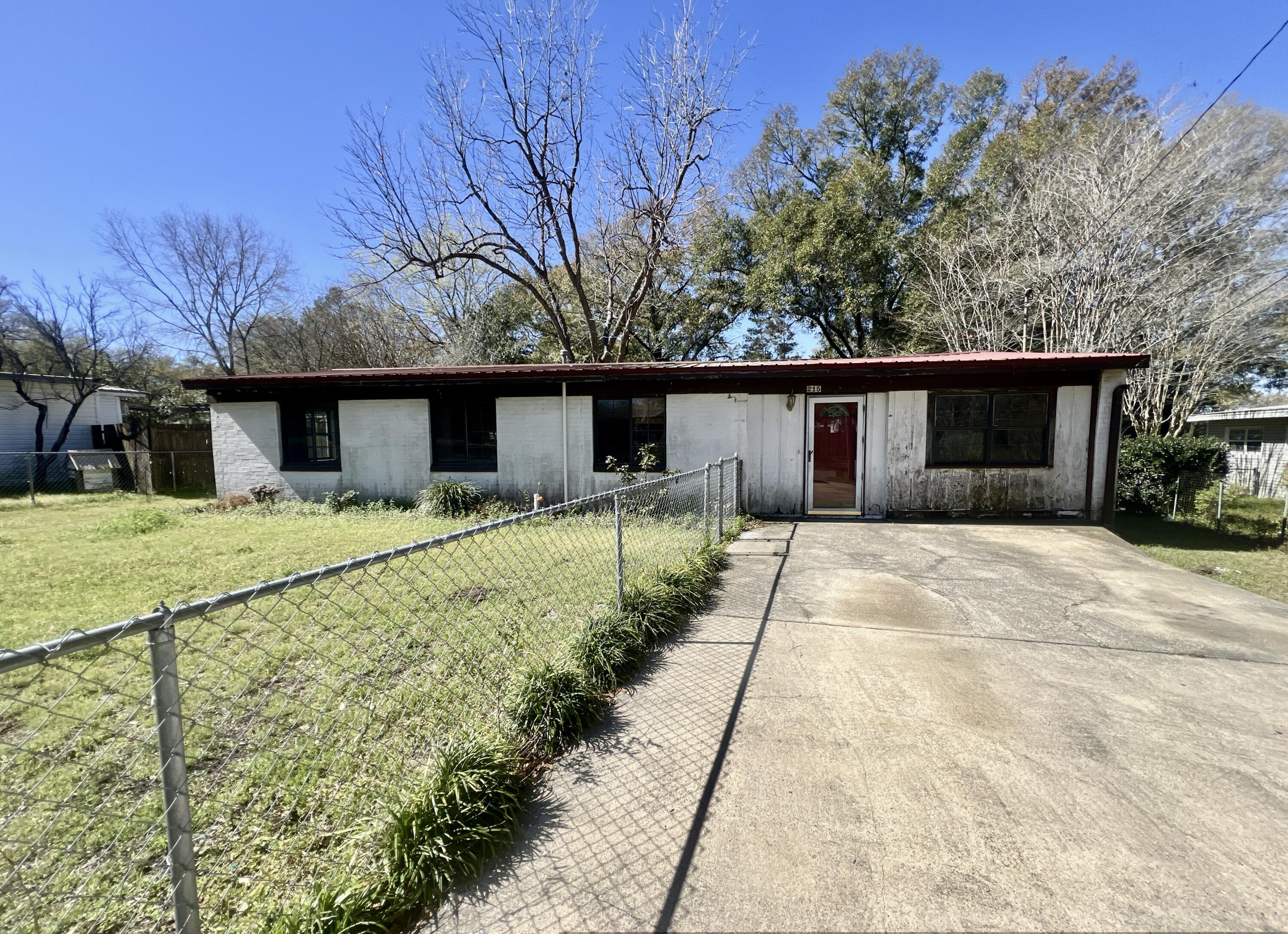 Located in center of Crestview, this REO home is located in the established neighborhood of Jernigan and is within just a few miles from schools, grocery, hospitals and more. Homes exterior is block with wood trim. This 3 bedroom 2 bath home has indoor laundry, gas water heater, central heat and air. Some there have been some updates in the paste, however, due to some repairs not all financing can be used to purchase this home. There is a wide range of financing options on this home, please consult with your lender for details. Call today for your showing!