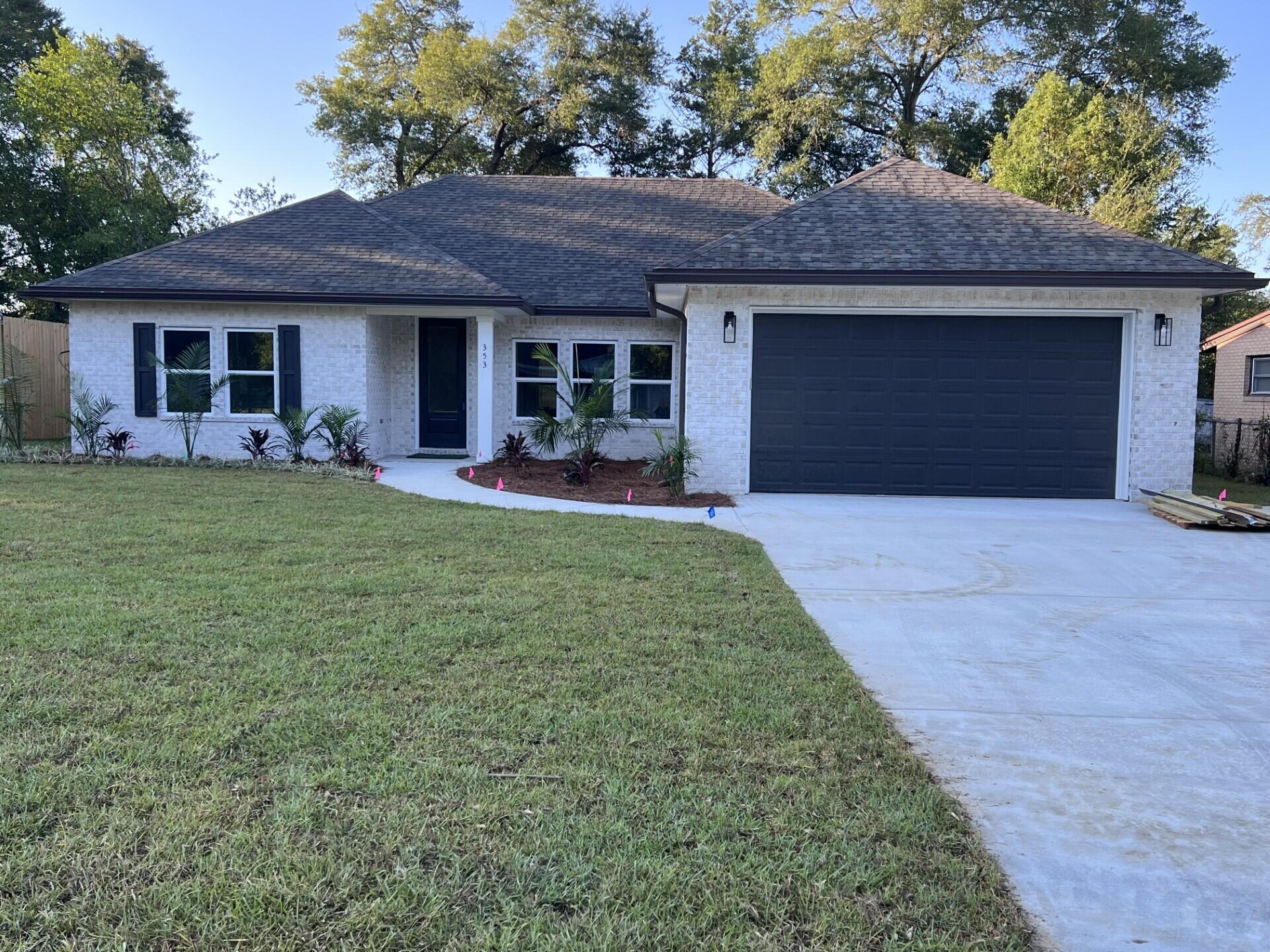 Come see this NEW CONSTRUCTION, CUSTOM BUILT, 4 bedroom, 2 bath home. The seller pays 10,000 towards the buyer's closing cost, doc stamps on the deed& owners title. This all brick home sits on .26 of an acre with no HOA fees. You'll LOVE this OPEN floor plan, featuring 9 ft. ceilings throughout and 10ft where reverse trey ceilings are located. This home boast many custom amenities. Upgraded spray foam insulation in the roof for energy efficiency, 8ft front & garage door, and extra parking pad for a boat or RV. The kitchen is divine, featuring white custom cabinets, soft close drawers, farm sink, gas stove, pantry, undermount lighting under cabinets and quartz countertops throughout. The island bar has an 18 inch over hang, a reverse trey ceiling in the family room with multi color options Enjoy the floor plug added in the family room for phone charges, and lamps without cords hindering walkways. Love entertaining? The kitchen and family room open up to a screened porch with an extra concrete pad for grilling and an extra patio set. The master bedroom has a trey ceiling with recess lighting and opens to a custom master bath. You will absolutely love everything about this bathroom! It's wonderful for relaxing, with endless hot water with the gas tankless hot water heater and the deep soaker tub. The master shower, boast custom tile with a rainhead, 2 separate sprayers, bench for sitting while shaving and seamless glass. You will actually want to do the laundry, with a custom folding table with butcher block, and built in shelves. When you want to relax and rewind, the back yard is the place. You'll enjoy a fully sodded yard, full gutters, sprinkler system, and a 8 ft. privacy fence, making up-keep easy. This home has everything and sits on a large lot.
Location is perfect, walking distance to A+school, restaurants, a large park with boat launch and minutes from restaurants, Eglin Air Force Base, Special Forces, Emerald Coast beaches, shopping, hospitals and more. Call today for a viewing, this won't last long! Home will be completed September 30, 2025.