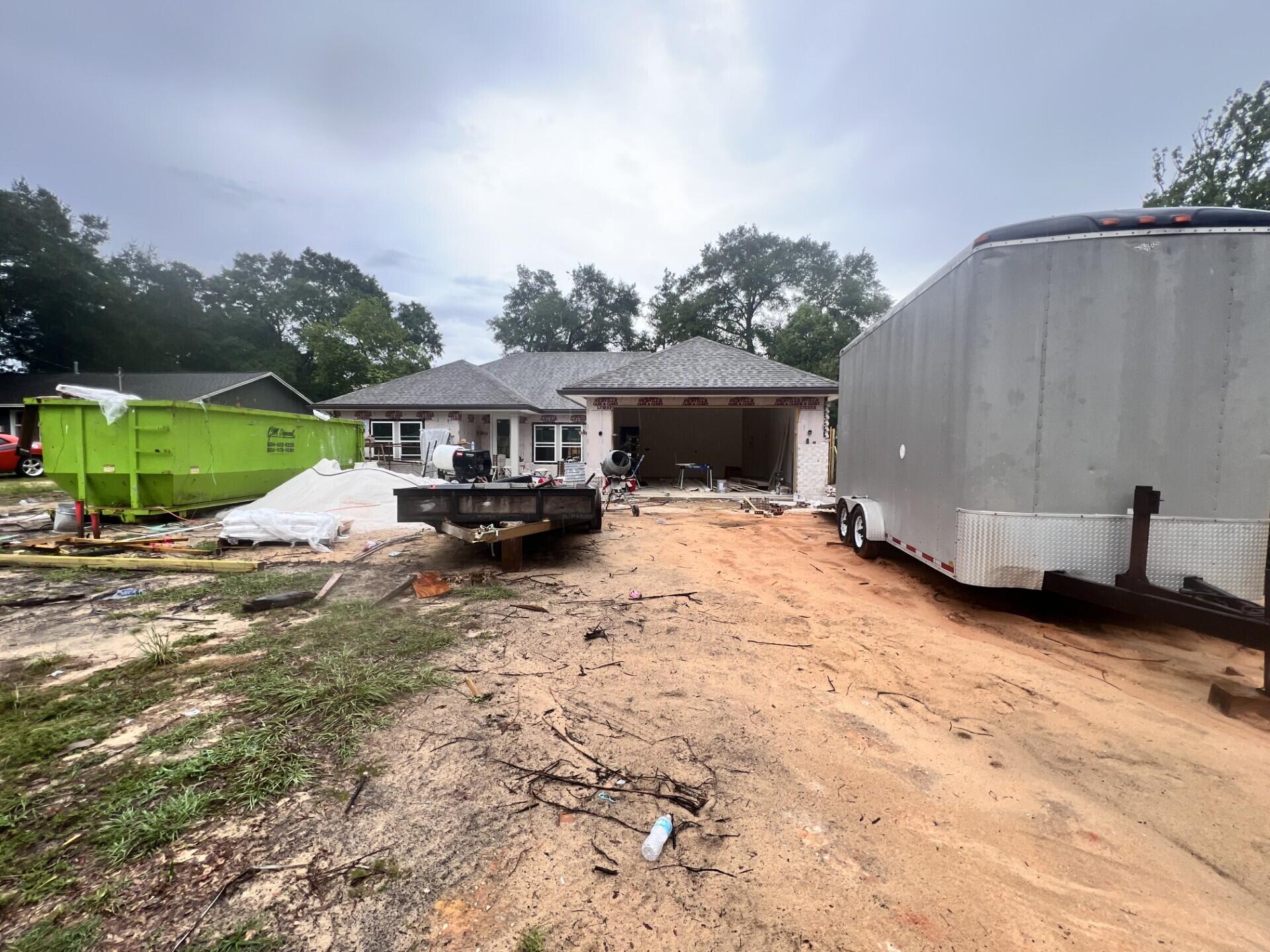 Come see this NEW CONSTRUCTION, CUSTOM BUILT, 4 bedroom, 2 bath home. The seller pays 10,000 towards the buyer's closing cost, doc stamps on the deed& owners title. This all brick home sits on .26 of an acre with no HOA fees. You'll LOVE this OPEN floor plan, featuring 9 ft. ceilings throughout and 10ft where reverse trey or trey ceilings are located. This home boast many custom amenities. Upgraded spray foam insulation in the roof for energy efficiency, 8ft front & garage door, and extra parking pad for a boat. The kitchen is divine, featuring white custom cabinets, soft close drawers, farm sink, gas stove, pantry, undermount lighting under cabinets and quartz countertops throughout. The island bar has an 18 inch over hang, a reverse trey ceiling in the family room multi color options. Enjoy the floor plug added in the family room for phone charges, and lamps without cords hindering walkways. Love entertaining? The kitchen and family room open up to a screened porch with an extra concrete pad for grilling and an extra patio set. The master bedroom has a trey ceiling with recess lighting and opens to a custom master bath. You will absolutely love everything about this bathroom! It's wonderful for relaxing, with endless hot water with the gas tankless hot water heater and the deep soaker tub. The master shower, boast custom tile with a rainhead, 2 separate sprayers, bench for sitting while shaving and seamless glass. You will actually want to do the laundry, with a custom folding table with quartz countertop, hanging bar and custom designer hooks attached above. When you want to relax and rewind, the back yard is the place. You'll enjoy a fully sodded yard, full gutters, sprinkler system, and a privacy fence, making up-keep easy. This home has everything and sits on a large lot.
Location is perfect, walking distance to restaurants, just minutes from A+ schools, Eglin Air Force Base, Special Forces, Emerald Coast beaches, shopping, hospitals and more. Call today for a viewing, this won't last long! Home will be completed September 30, 2025.