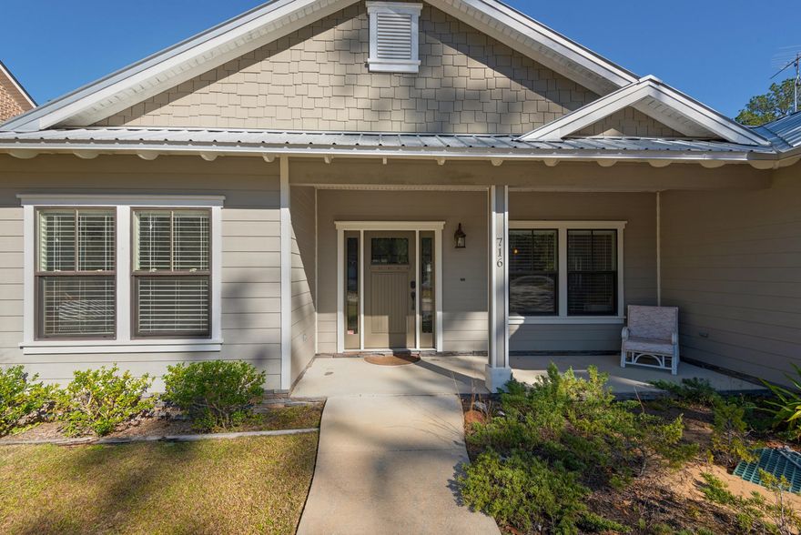 Beautiful! WATERFRONT home on MALLET BAYOU! Very popular location - Bay Grove Road. Great views of the bayou all through-out!  Peaceful neighborhood, amazing location. Open floor plan & high ceilings welcome you in The kitchen has a large island w/dining. Granite, stainless appliances, classic backsplash, large pantry and cabinets, enjoy cooking again! Separate Office or use as a bedroom/bonus room. Laundry room with plenty of room. Wood laminate flooring throughout w/carpet in bedrooms. Screened in back porch & workshop. Dock w/lift & fish-cleaning station. Quality construction, including crown molding, foam insulation & more. This is a well taken care of home that will be enjoyed for years!