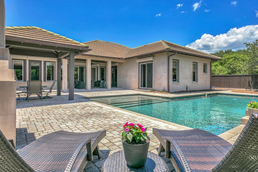 Third home from the Gulf with your own private pool! This gorgeous custom designed, single story home has never been rented. Wonderful location in Seacrest on a cul-de-sac street in a low-density neighborhood, no HOA, with deeded beach access. Upgrades throughout such as custom mill work, Walnut hardwood floors, Rustic Alder cabinetry, built-ins and a generously sized gourmet kitchen with Quartz countertops, farmhouse sink, double drawer dishwasher, gas range with convection oven, pot filler, uplighting and plenty of storage. Outdoors while enjoying the oversized pool with sun shelf, you'll find an expanded patio, covered gazebo and fireplace, all situated on a large lot. 1 mile from Alys Beach, 1.5 miles from Rosemary Beach.