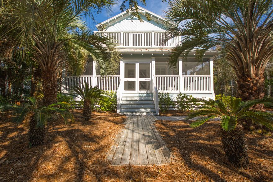 Enviably located on the popular east end of Scenic Highway 30A, only a mile east of Seaside, Florida's iconic town center, Grove by the Sea is as ideally suited for full-time living as it is vacation rentals. One of just a few in the community with its very own private pool, this home will offer its new owner a relaxing retreat able to produce rental income while not in use. Its floor plan has been optimized for maximum convenience and rental appeal with the addition of a third bath that serves one of the downstairs bedrooms while also allowing  access when coming in from the beach or pool. The first floor guest bedroom enjoys a private en suite bath. In addition to the sunny paver pool deck,