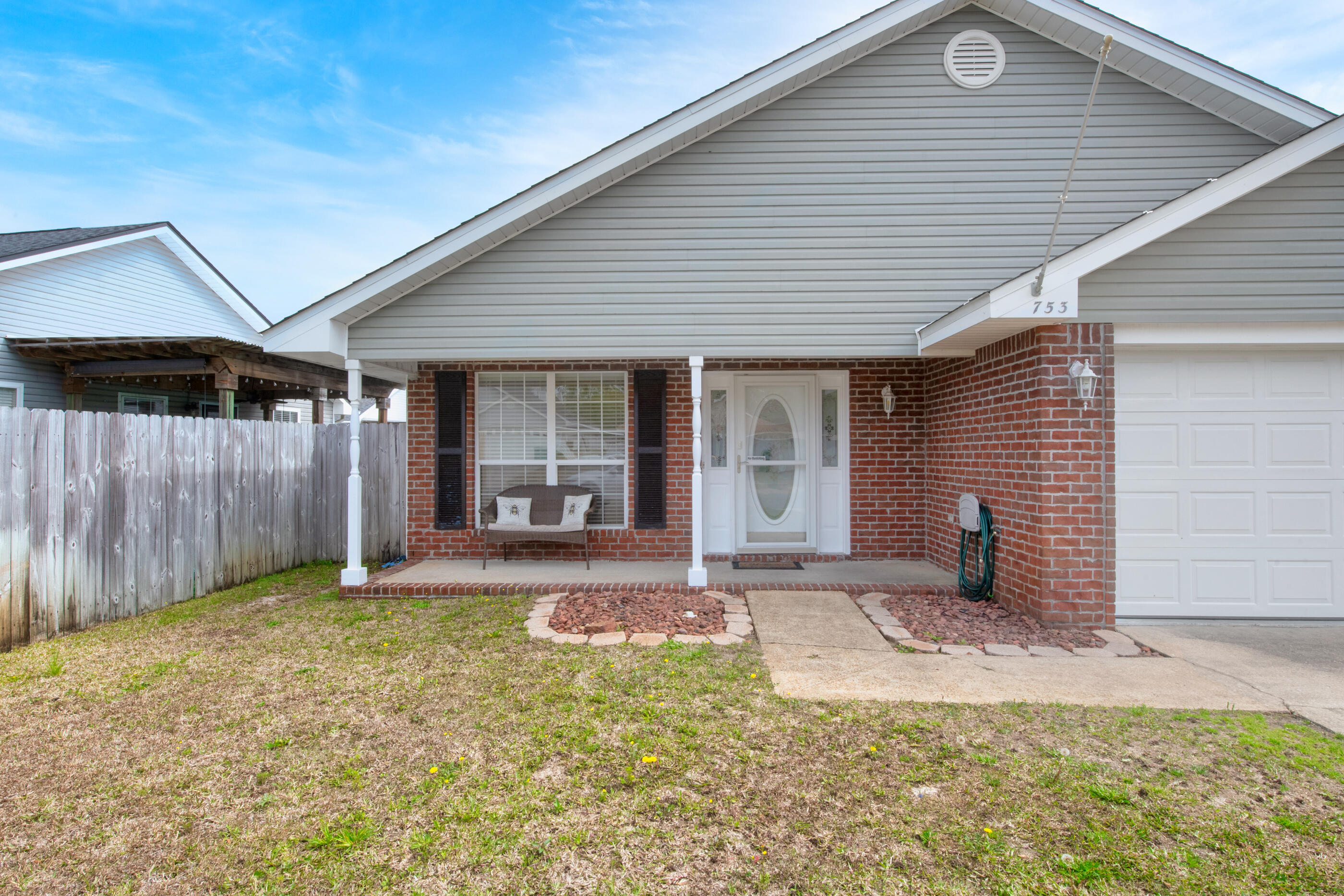 Looking for a home with the Florida lifestyle?  Check out this move in ready home located just outside the back gate of Hurlburt.  Enjoy relaxing and entertaining in your own private oasis with a gorgeous in-ground pool surrounded by brick pavers, an outside bar, pergola and a screened in porch.  Inside the kitchen features granite counter tops, stainless appliances, a pantry and overlooks the spacious living room.  The master bedroom overlooks the backyard and pool area and has plenty of room for all your furniture.  The master bath has an oversized shower and a cultured marble vanity.  The split bedroom floor plan offers privacy.  The indoor laundry room is conveniently located off the garage.   The roof was replaced in 2018, HVAC in 2019, new pool liner and Polaris  in 2018 and the hot