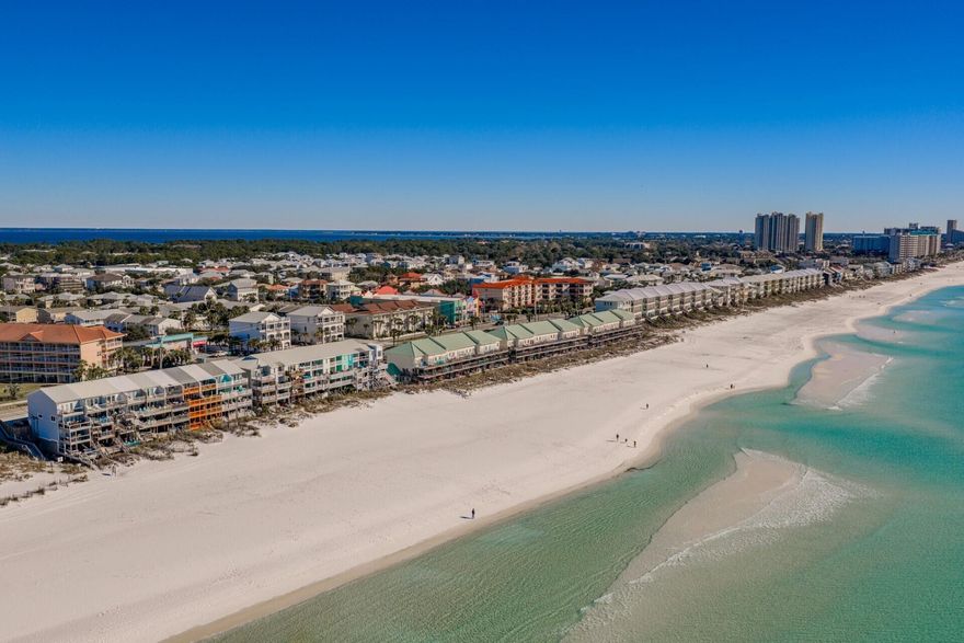 Postcard-Perfect Views | Rare Gulf-Front Offering in Miramar BeachIntroducing an exceptionally rare opportunity to own a true Gulf-front townhome directly on the sugar-white sands of Miramar Beach. Located within the intimate Costa del Sol community, this remarkable residence offers what few properties can -- step-off-the-deck access to the beach and unobstructed panoramic views of the emerald Gulf from every level.This is beachfront living in its purest form. Step from your private deck onto powder-soft sand, and within moments, you are standing at the water's edge. No roads to cross. No boardwalks. Just seamless coastal luxury. Read more... Property Highlights

3 Bedrooms | 3.5 Bathrooms | Sleeps 12 | Multiple Gulf-Front Balconies

Spanning three thoughtfully designed levels, this updated townhome blends refined comfort with breathtaking natural beauty.

Main Living Level (Second Floor Entry)

The primary living space features an open-concept design where the living room, dining area, and kitchen are all oriented toward sweeping Gulf views. Expansive glass doors invite natural light and open to a spacious beachfront balcony -- an ideal setting for entertaining or enjoying the rhythmic sound of the waves.

Upper Level - Private Retreats

Upstairs, two generously sized bedrooms each offer comfort and privacy.

The primary suite is a true sanctuary, featuring a king bed, stunning beach views, and a private Gulf-front balcony perfectly positioned for both sunrise reflections and dramatic sunset skies. The guest bedroom includes a queen bed and twin bunks, comfortably accommodating family and visitors.

Ground-Level Lockout Suite

The first floor offers a fully self-contained suite with its own private exterior entrance -- ideal for guests or enhanced rental flexibility. This level includes an open living area, kitchen and dining space, spacious bedroom with queen bed, sleeper sofa, twin-over-twin bunks, and a private bath. The lockout design provides privacy and versatility, making this property especially attractive as an income-producing investment.

Unmatched Location

Situated in Costa del Sol along Scenic Gulf Drive, this residence places you directly on the shoreline while remaining close to premier dining, shopping, and recreation.

Enjoy beachfront strolls to local favorites such as Pompano Joe's and The Whale's Tail Beach Bar & Grill for fresh Gulf seafood and waterfront dining.

Upscale shopping and entertainment are just minutes away at Silver Sands Premium Outlets and Destin Commons.

For water enthusiasts, the nearby Dolphin Reef offers exceptional snorkeling and marine life experiences just offshore.

A Rare Investment Opportunity

True Gulf-front properties with direct sand access and unobstructed views from every floor are extraordinarily limited in supply. With the ability to accommodate up to 12 guests and a layout designed for both privacy and gathering, this property offers strong rental potential while delivering an unparalleled coastal lifestyle.

This is more than a beach home -- it is a legacy property defined by Postcard-Perfect Views and timeless Gulf-front luxury.

Contact us today to schedule a private showing of this exceptional beachfront residence.