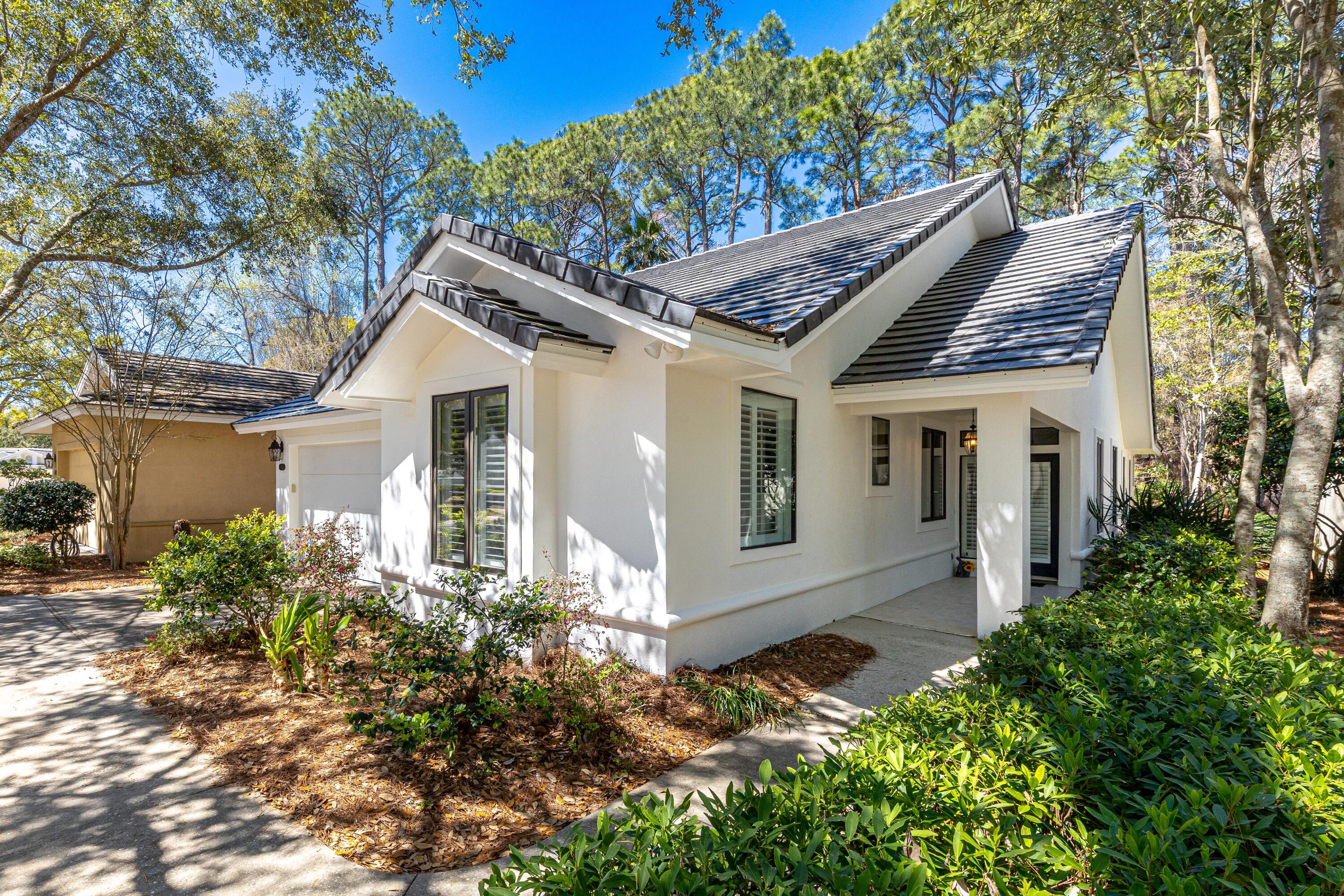 Nestled in the serene, rental-restricted community of St. Andrews, this updated, single story home offers privacy and tranquility with a wooded backdrop and creek views from the spacious back deck. Impressive upgrades include a 2025 concrete tile roof, 2024 GAS water heater, 2022 HVAC, and fresh interior/exterior paint. Hard surface flooring throughout, a wet bar with ice maker, and a kitchen range vented for GAS or electric add both style and convenience. The split-bedroom layout ensures privacy, with each bedroom featuring an ensuite bath. The open-concept kitchen, living, and dining area is perfect for entertaining, plus a bonus nook off the living room and guest bedroom makes an ideal office or art space. A rare find in a sought-after neighborhood--don't miss this opportunity! As an introduction to the Sandestin lifestyle, we invite our new owners to explore amenities that make Sandestin special. The listing brokerage and seller(s) are presenting the buyer(s) of this property with (2) 90-minute rounds of Tennis court time, a golf foursome at one of our three championship courses, and a round of golf for up to four (4) players at the unrivaled Burnt Pine Golf Club.
Sandestin Golf and Beach Resort features more than seven miles of beaches and pristine bay front, four championship golf courses, 15 world-class tennis courts, a 226-slip marina, a fitness center, spa and celebrity chef dining. Shop, dine and play at the charming pedestrian village, The Village of Baytowne Wharf and more. Inside the gates of the resort, residents enjoy a balanced lifestyle of high-class living, spanning the 2,400 acres from the beach to the bay. Everything within the gates of the resort is accessible by golf cart or bicycle. The entire resort is interconnected by miles of pedestrian, bike and golf cart paths that weave through groves of live oaks, meandering past natural lagoons, fountains, man-made lakes, and meticulously landscaped fairways.