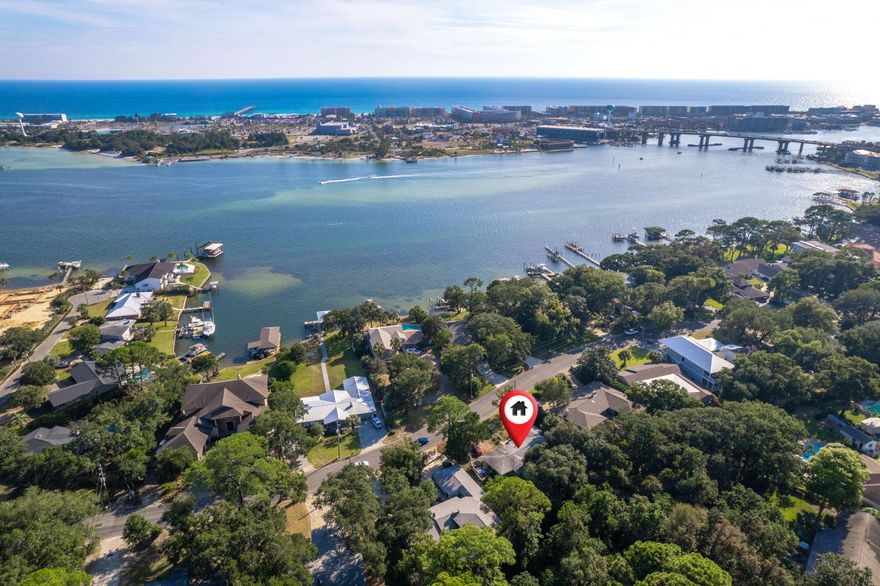 Calling all investors! This home is in the prime location. It has a brand new HVAC is 2022, HWH 2022, ROOF 2014; This is a block home on one of the largest lots in the neighborhood. There are TWO bonus/flex rooms with endless possibilities.  It is walking distance to a public dock with access to the Intercoastal Waterway. It has original wood floors that may be able to be restored to it original beauty.