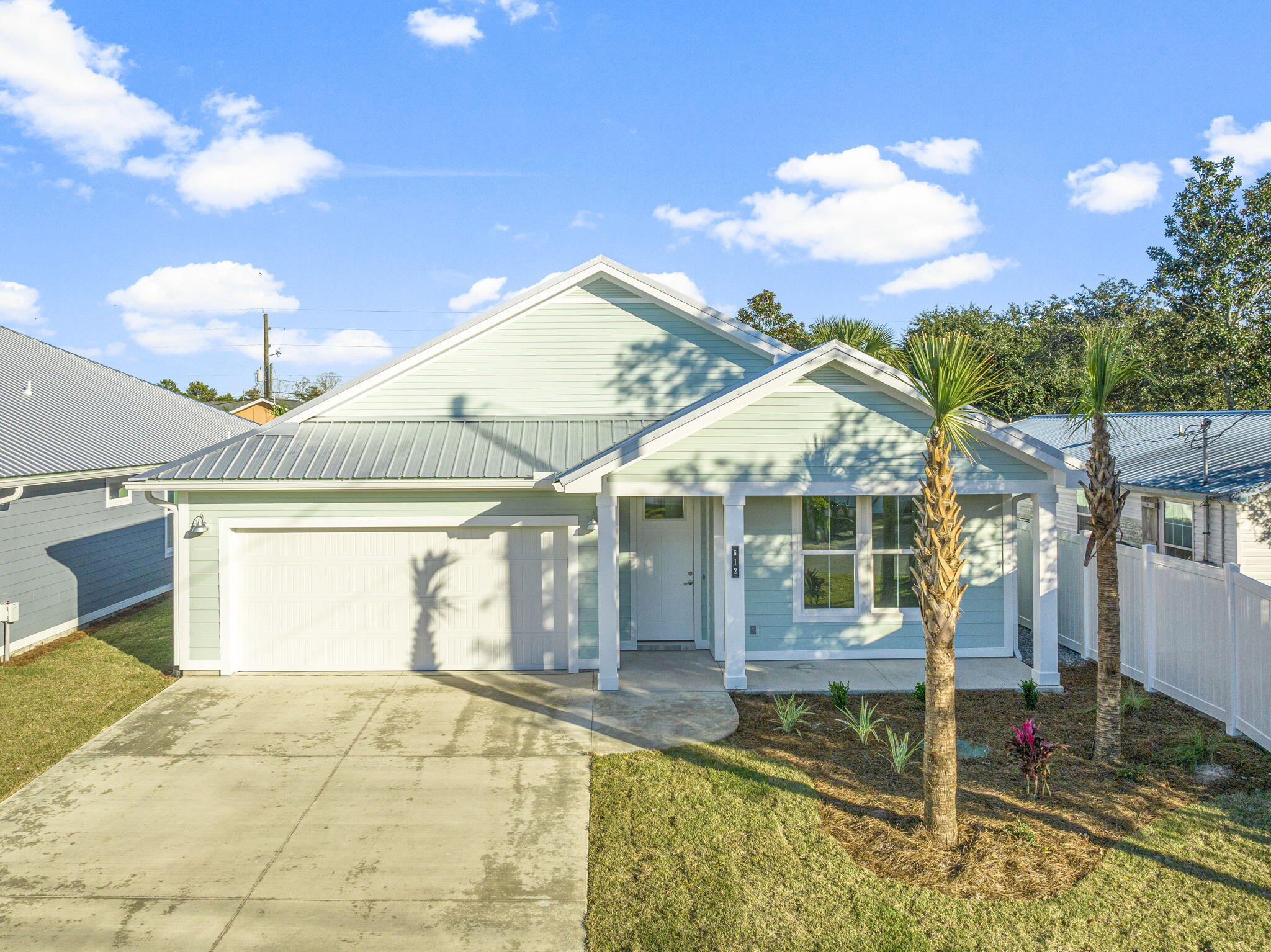 Brand-new home nestled in the tranquility of West End Panama City Beach. Enjoy the peaceful ambiance of one of the area's quietest streets while relishing in the convenience of being mere minutes from the Publix shopping center and the vibrant dining and shopping scene of 30A. This impeccable 3-bedroom, 2.5-bathroom residence showcases modern amenities designed for comfort and efficiency. Inside, the spacious interior features lofty 9-foot ceilings, complemented by elegant 8-foot doors. The kitchen is equipped with sleek quartz countertops, top of the line stainless steel appliances, and a pot filler offering a modern and durable cooking environment, while recessed lighting fixtures contribute to a contemporary ambiance.