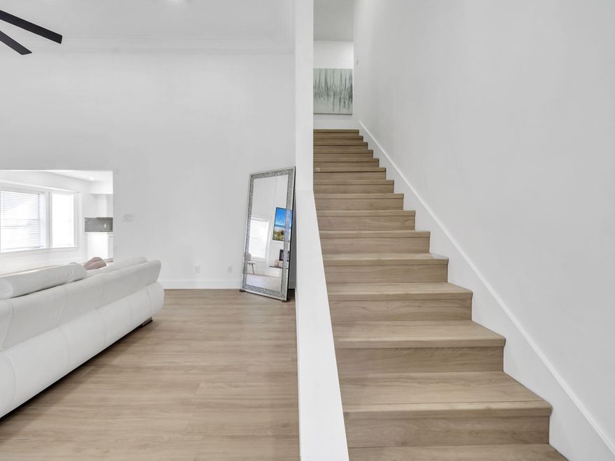 Welcome to this stunning fully remodeled home on Quailwood Drive, where modern design meets everyday comfort. Step inside to a bright, open layout with all-new flooring, fresh neutral paint, updated doors and trim, and thoughtfully selected fixtures. The kitchen shines with brand-new cabinets, stone countertops, stainless appliances, and a spacious island perfect for entertaining. Bathrooms have been completely transformed with high-end tile work, new vanities, upgraded lighting, and a clean, contemporary aesthetic. The home sits on a desirable corner lot, offering added privacy, mature landscaping, and plenty of outdoor space. Every detail has been addressed -- this home truly feels like new construction, but in an established Destin neighborhood with no work left for the next