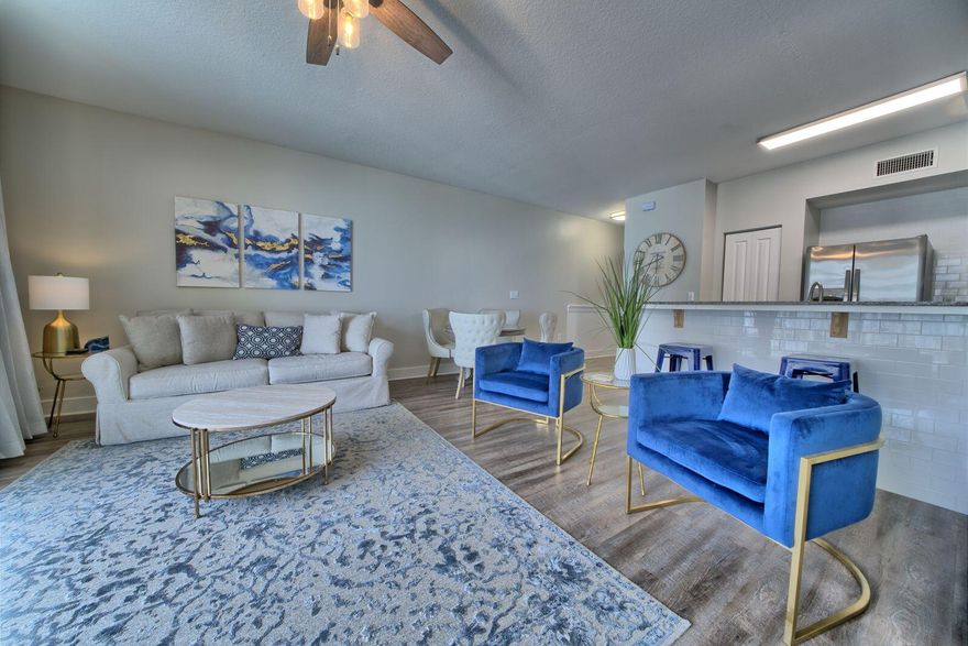 This gorgeous, condo in the luxurious Shores of Panama is fully furnished, rental ready. This ''N'' unit offers an open floor plan kitchen/dining/living room with one bedroom, a bunk room & 2 full bathroom. With laminate floors throughout, the kitchen features granite counters, white shaker cabinets, stainless steel appliances & in-unit stackable washer & dryer. Featuring contemporary furniture, the living room and balcony have views of the emerald coast & lagoon-style pool. Shores of Panama is a 23 story Tuscany style condo of Gulf front luxury accommodations with unparalleled amenities such as 500' Gulf frontage, heated indoor pool, hot tub, covered on-site parking deck, health center with fitness, two tiki bars, beach activities and rental services. Schedule your showing today!