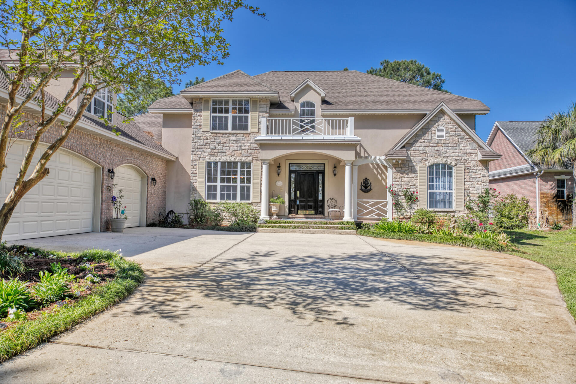 You'll never miss a sunset when you make this custom-built waterfront home with panoramic Choctawhatchee Bay views from almost every room your new home! Be sure to bring your boat as this property has a Private 125'+ dock  (owners kept their 27' Wellcraft boat there) with an upper deck - the perfect place to watch the July 4th fireworks from Boggy Bayou, Destin Commons, Sandestin, FWB & East Pass (weekly in summer). This property is located in the Raintree Estates Subdivision and has too many features to list so be sure to see the very detailed information in the MLS Documents.  The floorplan was strategically designed by the owner with extensive thought put into every detail. (Click More)