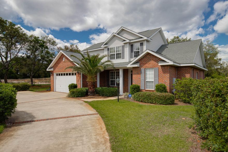 This light, bright, move-in ready home will wow you! With 3 bedrooms and a flex room, you'll find plenty of space in this beautiful home. A downstairs master bedroom features trayed ceilings, a large en-suite bathroom with double vanity, garden tub and separate shower, and a huge walk-in closet. The living area is perfect for entertaining, and fairly open to the kitchen. The kitchen features Corian counter tops, stainless steel appliances, and a gas stove. There is an additional room downstairs that may be used for an office or formal dining room. Schedule your appointment to view this home today. You won't want to miss it!