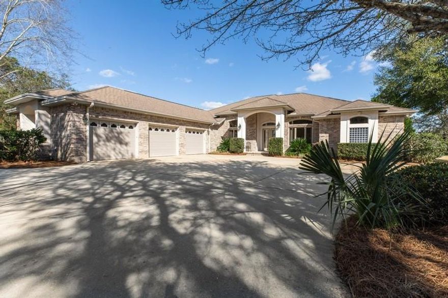 Golfer's delight! You will love the curb appeal of this beautiful 4 br, 3 ba, 3,832 sq ft executive home stately situated on a large .65 acre level lot. You will find that this brick custom home is not your typical cookie cutter home. The owner was in the business and managed every detail of the construction, personally choosing the materials and subcontractors. Upon entering, you may wonder why the home feels so impressive. Maybe the grandeur of this home stems from the fact it was built on a bigger scale, with finer details than you normally see. For example, the 12+ foot ceilings, eight foot doors, and extensive trim work all add to the striking appearance, ambiance and vibe of the home. The home has been freshly painted and has new carpeting.(see additional information)