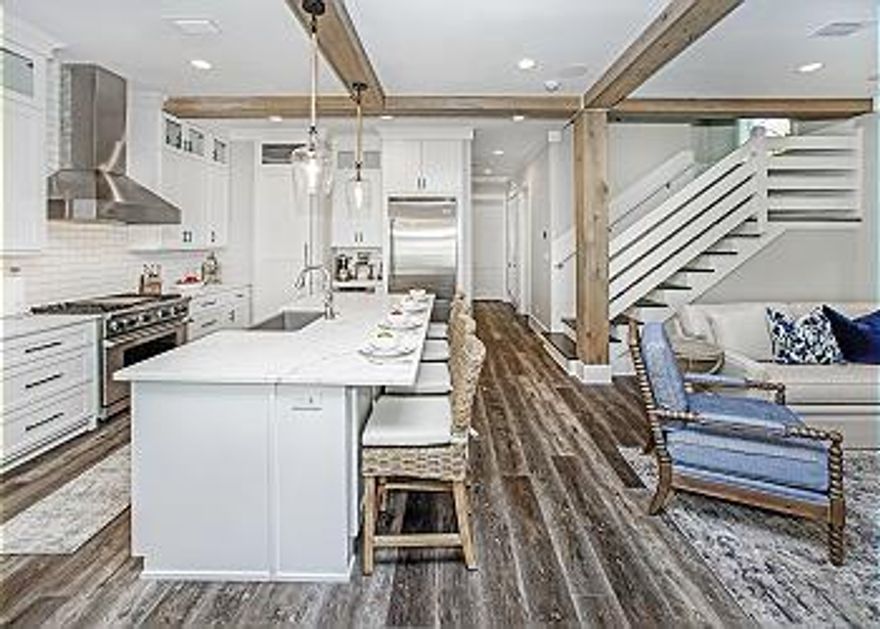 Looking for a luxury custom-built home in one of the top upscale locations on 30A?  How about the finest built home in Seacrest Beach directly on one of the prime, sought after, pool front spots?  Look no further for one of the most beautifully finished and decorated 5-bedroom 5.5 bath luxury vacation rental engines on the market.  Only minutes away from the deeded beach access this stylish coastal contemporary gem boats almost 3000sqft of luxury living with big wide-open spaces perfect for entertaining a large family and guests.  The home boasts an open concept Great Room, Dining Room and Kitchen combination with large Island, luxury Viking appliances, 10' ceilings with exposed wood beams, and shiplap walls throughout. Each room is crafted for roomy enjoyment of each guest.