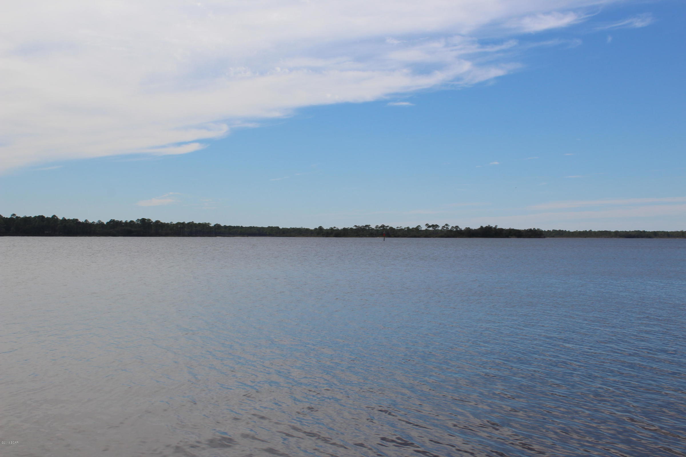 Waters Edge is a 58 lot Community. Every lot has sold, this lot was originally bought for $100,000.00 . Now for pennies on the dollar you can come build your home to enjoy the peaceful bliss, quiet serenity of this forgotten location. Community is Bay front, take those quiet walks, enjoy!