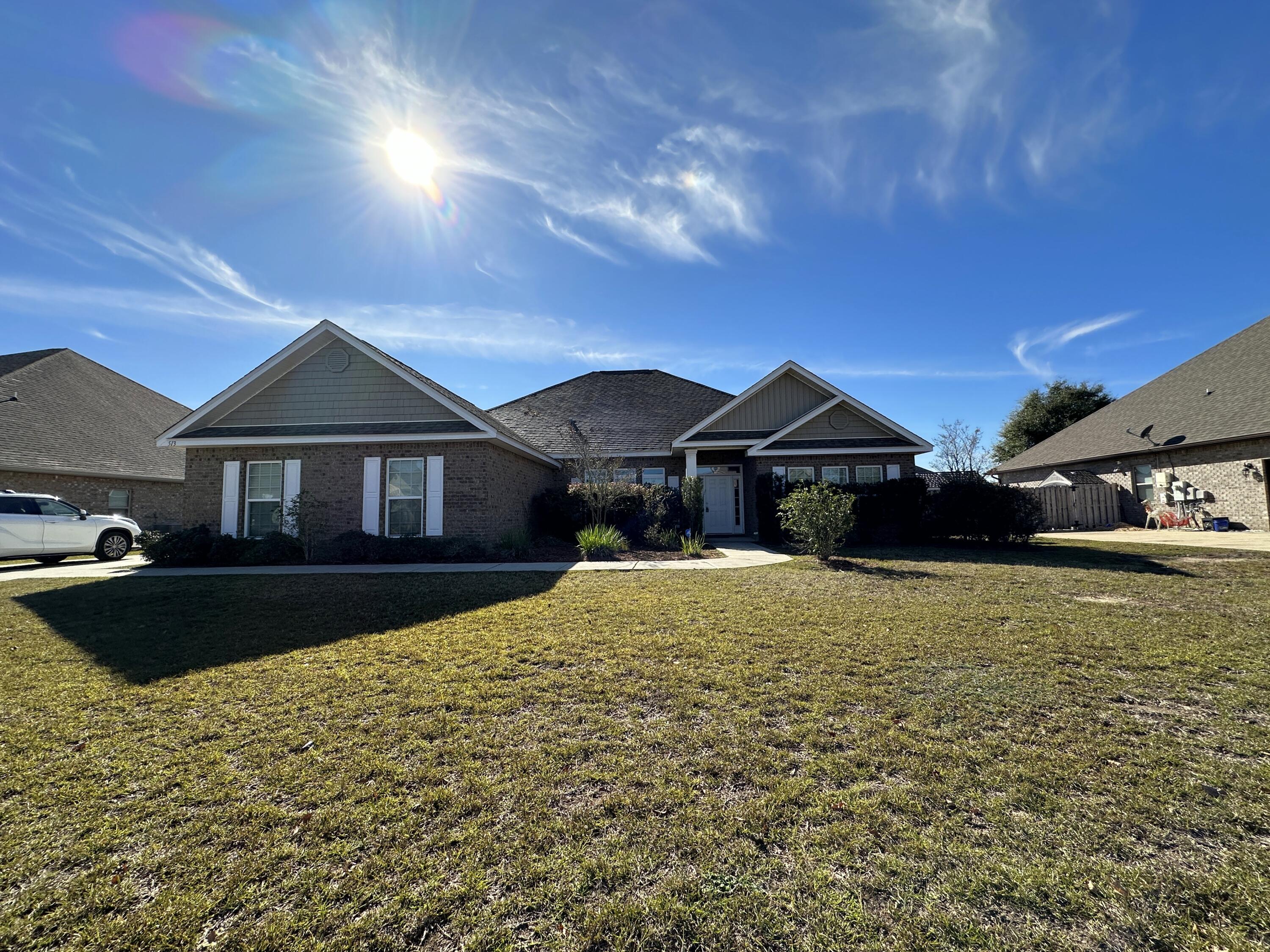 Gorgeous home in convenient south Crestview location. Minutes to Elementary and Middle schools, shopping, hospital, dining and more. This home features spacious rooms throughout to include a large living room, formal dining room, study and breakfast room. The kitchen has a massive center island, tons of cabinet space, double ovens, built in stovetop, vent hood and pantry. There is plenty of storage throughout the house with closets everywhere. The master suite features a separate shower and garden tub, huge walk-in closet and beautiful trayed ceilings. The backyard is privacy fenced, the garage is a side entry and there is a community pool for your use. This is a great and spacious home, so call today!