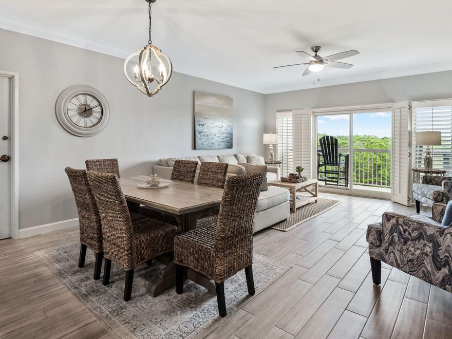 The Summit building rests atop a 34-foot bluff overlooking the 52-acre gated Gulf front community of Tops'l Beach and Racquet Resort along Northwest Florida's Emerald Coast. This 4th-floor unit faces east towards the historic neighborhood of Four Mile Village, the Coffeen Nature Preserve, and Gulf of Mexico beyond. The 9-foot ceilings and floor-to-ceiling sliding glass door and windows in the living room accentuate the spaciousness of its open floor plan. The master suite features a private bathroom with a spacious walk-in shower, double vanity, as well as a large jetted bathtub. Fantastic second home or vacation rental, this unit has been nicely decorated and features attractive tile floors throughout the principal living areas. Having been designed as a lock-out, it can be rented as a full three-bedroom unit, or separately as one and two-bedroom units.  Tops'l Beach and Racquet Resort offers world-class amenities that include 600 feet of beachfront, a fitness club with 14 tennis courts, on-site tennis pros, racquetball, aerobics, on-site massage therapy, swimming pools, steam and sauna rooms, a whirlpool, gated entry, security as well as an on-site bar and restaurant.