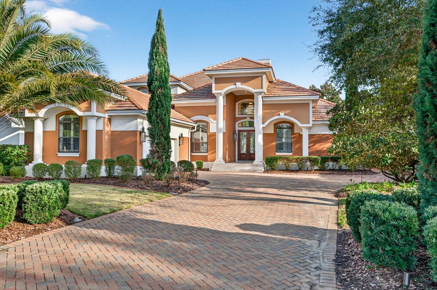 This exquisite home, located on the 15th green of Regatta Bay's impressive 18-hole golf course, offers luxury and elegance at every turn. Featuring an open floor plan with 4 bedrooms, an additional office, a formal dining area, a newly remodeled heated pool and spa with a sitting area and outdoor kitchen, and a 2-car plus golf cart renovated garage with mini-split unit to keep the garage cool during hot summers, this residence provides ample space and versatility for any lifestyle. Gas lights add warmth and style to the entry and pool area, complemented by newly installed landscaping and lights. The grand living and family rooms boast soaring 22' ceilings, creating an expansive and airy ambiance. Crown molding and recessed lighting enhance the sophisticated atmosphere, while abundant sunshine illuminates the space. Recently updated with a 22' fireplace, new wood floors, and freshly painted walls, lighting, trim, and ceilings, the home's interior is both modern and welcoming. The open archways contribute to the seamless flow of the floor plan, perfect for entertaining and everyday living. Custom woodwork, new railings, and wood treads installed on the grand stairs enhance the home's aesthetic appeal.
The private first-floor main suite is a true retreat, featuring a newly renovated primary bathroom. The double French doors from the primary bedroom open to the pool and lanai area. This outdoor oasis includes a summer kitchen and spa, offering a serene setting for relaxation and outdoor dining. Inside the suite, you'll find his-and-her newly renovated walk-in closets, a luxurious sunken spa tub, a spacious shower with dual shower heads, and a double-sink vanity, providing a spa-like experience at home.
The gourmet kitchen is a chef's dream, equipped with quartz countertops with up-lighting, new cabinets, and top-of-the-line Wolf stainless steel appliances. A Subzero refrigerator ensures high-end refrigeration to match the sophisticated design. New sink, faucets, and fixtures complete the modern and sleek kitchen, making it a central hub for family gatherings and culinary creations.
The second-floor living area is ideal for guests or additional family members. Whether used as a private retreat or an entertainment area, this space adds to the home's flexibility and appeal.
Experience the ultimate in luxury living with this masterpiece in the prestigious Regatta Bay community. With its prime location on the golf course, stunning design, and exceptional amenities, this home is a true gem.