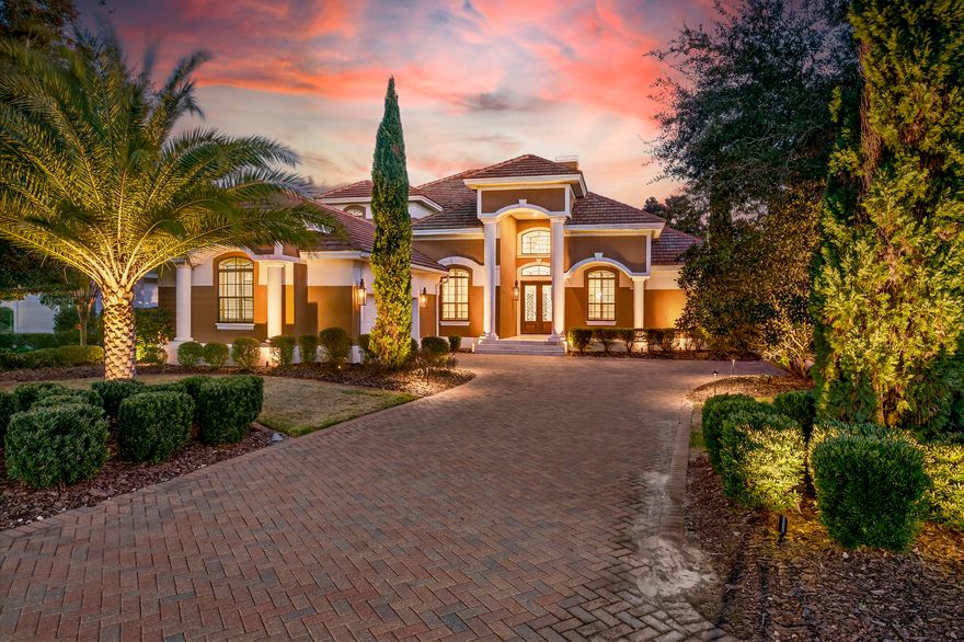 This exquisite home, located on the 15th green of Regatta Bay's impressive 18-hole golf course, offers luxury and elegance at every turn. Featuring an open floor plan with 4 bedrooms, an additional office, a formal dining area, a newly remodeled heated pool and spa with a sitting area and outdoor kitchen, and a 2-car plus golf cart renovated garage with mini-split unit to keep the garage cool during hot summers, this residence provides ample space and versatility for any lifestyle. Gas lights add warmth and style to the entry and pool area, complemented by newly installed landscaping and lights. The grand living and family rooms boast soaring 22' ceilings, creating an expansive and airy ambiance. Crown molding and recessed lighting enhance the sophisticated atmosphere, while abundant sunshine illuminates the space. Recently updated with a 22' fireplace, new wood floors, and freshly painted walls, lighting, trim, and ceilings, the home's interior is both modern and welcoming. The open archways contribute to the seamless flow of the floor plan, perfect for entertaining and everyday living. Custom woodwork, new railings, and wood treads installed on the grand stairs enhance the home's aesthetic appeal.
The private first-floor main suite is a true retreat, featuring a newly renovated primary bathroom. The double French doors from the primary bedroom open to the pool and lanai area. This outdoor oasis includes a summer kitchen and spa, offering a serene setting for relaxation and outdoor dining. Inside the suite, you'll find his-and-her newly renovated walk-in closets, a luxurious sunken spa tub, a spacious shower with dual shower heads, and a double-sink vanity, providing a spa-like experience at home.
The gourmet kitchen is a chef's dream, equipped with quartz countertops with up-lighting, new cabinets, and top-of-the-line Wolf stainless steel appliances. A Subzero refrigerator ensures high-end refrigeration to match the sophisticated design. New sink, faucets, and fixtures complete the modern and sleek kitchen, making it a central hub for family gatherings and culinary creations.
The second-floor living area is ideal for guests or additional family members. Whether used as a private retreat or an entertainment area, this space adds to the home's flexibility and appeal.
Experience the ultimate in luxury living with this masterpiece in the prestigious Regatta Bay community. With its prime location on the golf course, stunning design, and exceptional amenities, this home is a true gem.