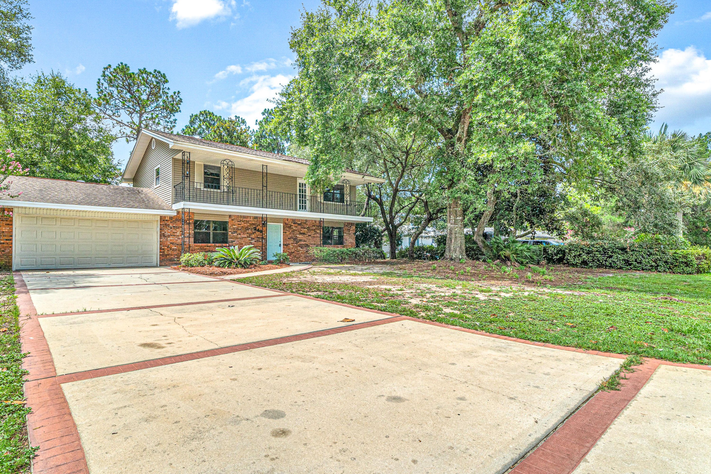 Renovated 4 Bed 2.5 Bath Home in Bluewater Bay - Niceville w/ fenced in yard! The Kitchen has NEW solid wood White Shaker Cabinets, gorgeous Granite countertops, and Stainless Steel Appliances. The Luxury Vinyl Plank Flooring in living and wet areas ensures low maintenance. There are plenty of living areas including a formal living room and den. New Bathroom Vanities, toilets, and Fixtures. Enjoy entertaining in this large yard! This home is Move In Ready fresh paint, new carpet, newer roof and much more! Copper wiring! Great neighborhood close to all of Bluewater Bay and Niceville amenities. Only minutes to the mid bay bridge and Destin! Schedule your tour today!