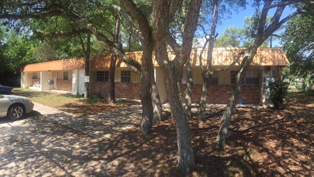 17 unit residential apartment complex fully leased, each unit rents for $600 a month, directly across he road from the ball park in Shalimar, FL, new roof recently installed