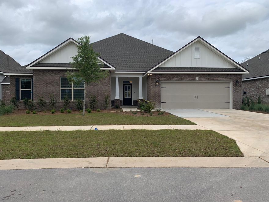 The TAFT IV G in The Trails at Hammock Bay community offers a 4 bedroom, 2.5 bath bathroom, with an open design. Upgrades include luxury wood look tile flooring, blinds, quartz counters, upgraded cabinets and more! Special Features: Private water closet, double vanity, soaking tub, separate shower, walk-in closet in the master suite, covered rear patio, recessed can lighting, ceiling fans in living area and all bedrooms, framed mirrors for all bathrooms, undermount sinks, bronze plumbing fixtures, smoke and carbon monoxide detectors, garage door with hardware and two remotes, seasonal landscaping package, architectural landscaping package, 30 year shingles and more! Energy Efficient Features: Gas appliance package, Vinyl Low E MI windows and more!