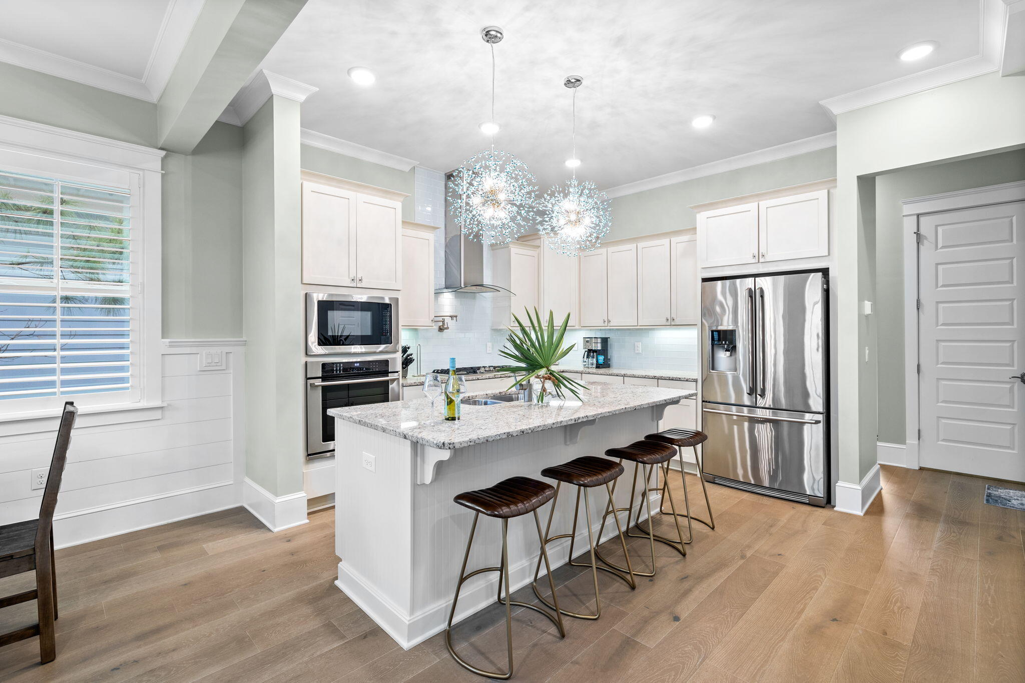 Major price improvement on this investment property. Welcome to the serene elegance of 67 East Crabbing Hole Lane, a coastal haven where luxury meets comfort. This enchanting four-bedroom, 4.5-bathroom beach house is now inviting new owners to start their chapter in a home that seamlessly blends indoor charm with outdoor allure.From the moment you step inside, the brand-new interior paint and carefully selected coastal decor signal that this isn't just any property--it's a lifestyle.The airy open concept living, dining, and entertaining space on the first floor is bathed in natural light, highlighting the wire-brushed engineered hardwood floors that flow throughout the home.The culinary-inspired kitchen is a dream for those who love to cook and entertain, boasting a large walk-in pantry. The spacious first-floor master ensuite has private access to the back porch. Upstairs, a second master ensuite includes a soaking tub and glass-enclosed shower. The second floor also has two additional guest bedrooms - both with access to a second floor porch that overlooks the quiet side of this bustling neighborhood.
This home offers practicality with three parking spaces, extra storage under the stairs, and a one-car garage. Offered fully-furnished and turnkey this home south of 30A has never been rented and was cherished as a second home by its current owners. With over $150K in projected gross rentals for this property, it makes a compelling investment as an income producing property, primary residence or second home. Prominence is a bustling beach town on 30A with both high-quality homes, and townhomes. With two resort style pools, one heated during winter months, onsite security, workout room and outdoor grills you will feel right at home with easy beach access at Dune Lake State Park or numerous public beach access points within a short bike or golf cart ride. Convenient to world-class dining, shopping and entertainment in 30A communities of Rosemary, Seacrest and Alys, Seaside and Seagrove Beaches. This home is currently a primary residence and has never been rented. Information is deemed reliable but not guaranteed. Buyer to verify all information and dimensions.