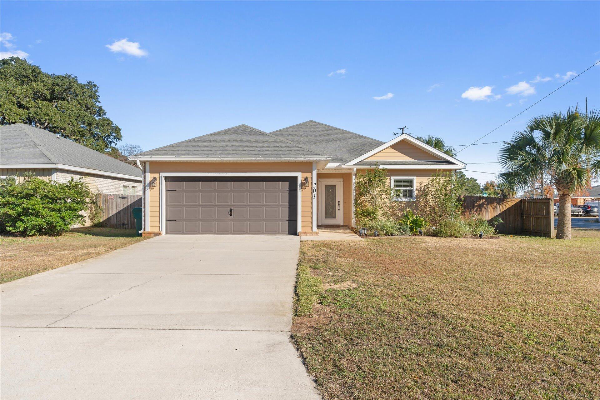 Move in Ready and sparkling clean!! Awesome location just 4 miles west of Hurlburt Field. No HOA! Freshly painted entrance welcomes you home. From the moment you step in the front door you will feel right at home. Large kitchen with plenty of room to add an island. Breakfast bar. Very Spacious living room with tile floors. Plenty of windows throughout the home afford  plenty of natural light. Primary suite at the back of the home.  2nd and 3rd bedrooms off the dining area. 2 car garage. Fully fenced backyard with a side gate. Enjoy the evenings on the back patio. Landscaping at the front of the home includes rose and sweet olive bushes. 2016 Roof, HVAC and water heater. Gutters on front of home installed Nov 24. Perfect home or STR. 7.7 miles to Navarre Beach Pier.