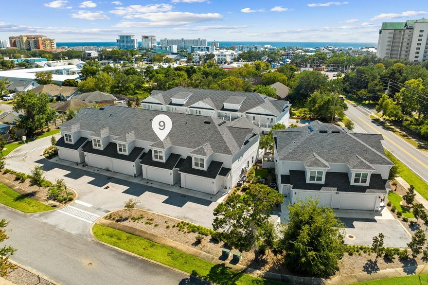 Offering a $10,000 buyer credit! This thoughtfully designed Beach Lofts townhome offers the ideal blend of comfort, space, and convenience in the heart of Destin. With approximately 1,758 square feet, the home features an easy open concept main level where the spacious family room flows through double doors to a covered patio that is perfect for morning coffee, evening breezes, or casual entertaining.The kitchen is bright and inviting with white cabinetry, stainless steel appliances, plenty of storage, and a large center island with seating. A half bath on the main level adds everyday convenience. Upstairs, all three bedrooms are positioned together, including a generous primary suite complete with a cozy window seat, large walk in closet, and a private ensuite bath featuring a double vanity, tile shower, and water closet. The two additional bedrooms share a well appointed hall bath with a double vanity and shower and tub combo. Both rooms open directly onto an upstairs covered patio overlooking the pool, creating a relaxing retreat just steps from your bedroom.

The location is a standout for everyday living. Beach Lofts sits minutes from Destin Commons, HarborWalk Village, local restaurants, grocery stores, and the emerald waters that make Destin famous. Quick access to Highway 98 keeps daily errands and commutes simple with easy reach to surrounding communities and major conveniences. Whether you are looking for a full time home, a personal coastal getaway, or a residence with the option for long term rental flexibility in the future, this Beach Lofts unit offers comfort, style, and a prime location along the Emerald Coast.