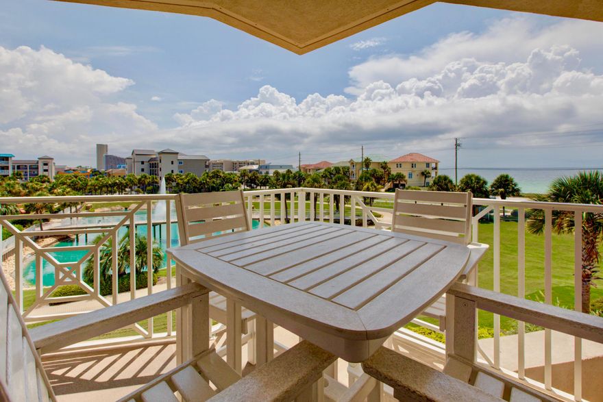 Fabulous unobstructed views of the pristine Gulf of Mexico in this freshly updated large two bedroom condo at Amalfi Coast Resort. Beautifully renovated with wood look tile throughout, HVAC and compressor replaced in 2017, solid surface countertops, all new light fixtures, and all new furniture in the last four years finished with tasteful coastal decor. Used by owner as second home but can be short term rental if desired. Amalfi is a concrete and steel constructed complex on 8 1/2 lush acres, gated and fenced with grilling areas, 360 Ft of unobstructed Gulf views. Fitness center, 2 pools, one heated, two lighted tennis courts and clubhouse. This condo comes with a deeded garage parking space worth $25,000 plus locked interior storage cage.