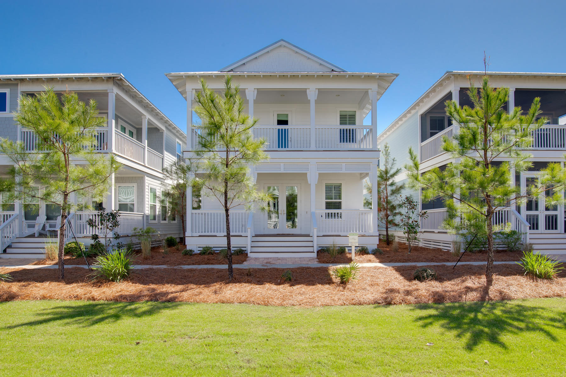 The only Grayton available in the community with 2nd floor porch AND 2 car garage! Unique homesite overlooking Palmetto Park- where the kids can play and adults can relax on the big porches. In a completed part of the community with no construction. Light, bright finishes throughout including carrera marble countertops, white cabinets, ship lap walls & White tile in baths. Open, flowing 1st floor is very inviting for entertaining with large kitchen island and plenty of cabinet space! This home is being offered furnished. Just over a year old- new home where a lot of the work has already been done for you. Designer lighting over island and dining table and plantation shutters. Rental projections are $47,000! NatureWalk at Seagrove has become the resort style community go to for many! With 2 pools (including a heated lap pool), kiddie pool, fire pits, grill, hot tub AND golf cart shuttle to the beach. Biking distance to Seaside & Watercolor. Just grab your flip flops and come on- this one won't last long.